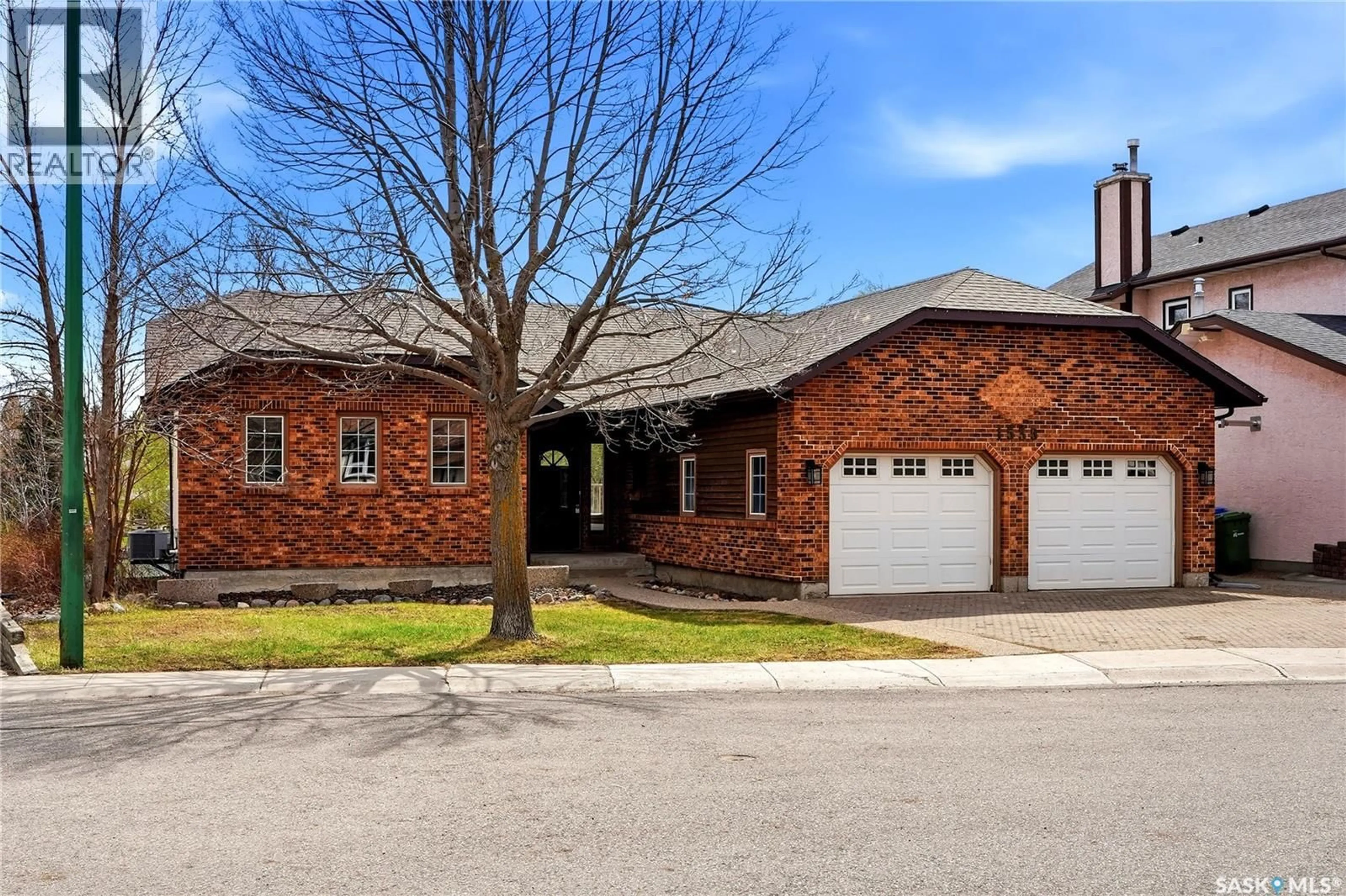 Home with brick exterior material, street for 1535 LEE GRAYSON CRESCENT, Regina Saskatchewan S4X3Z9