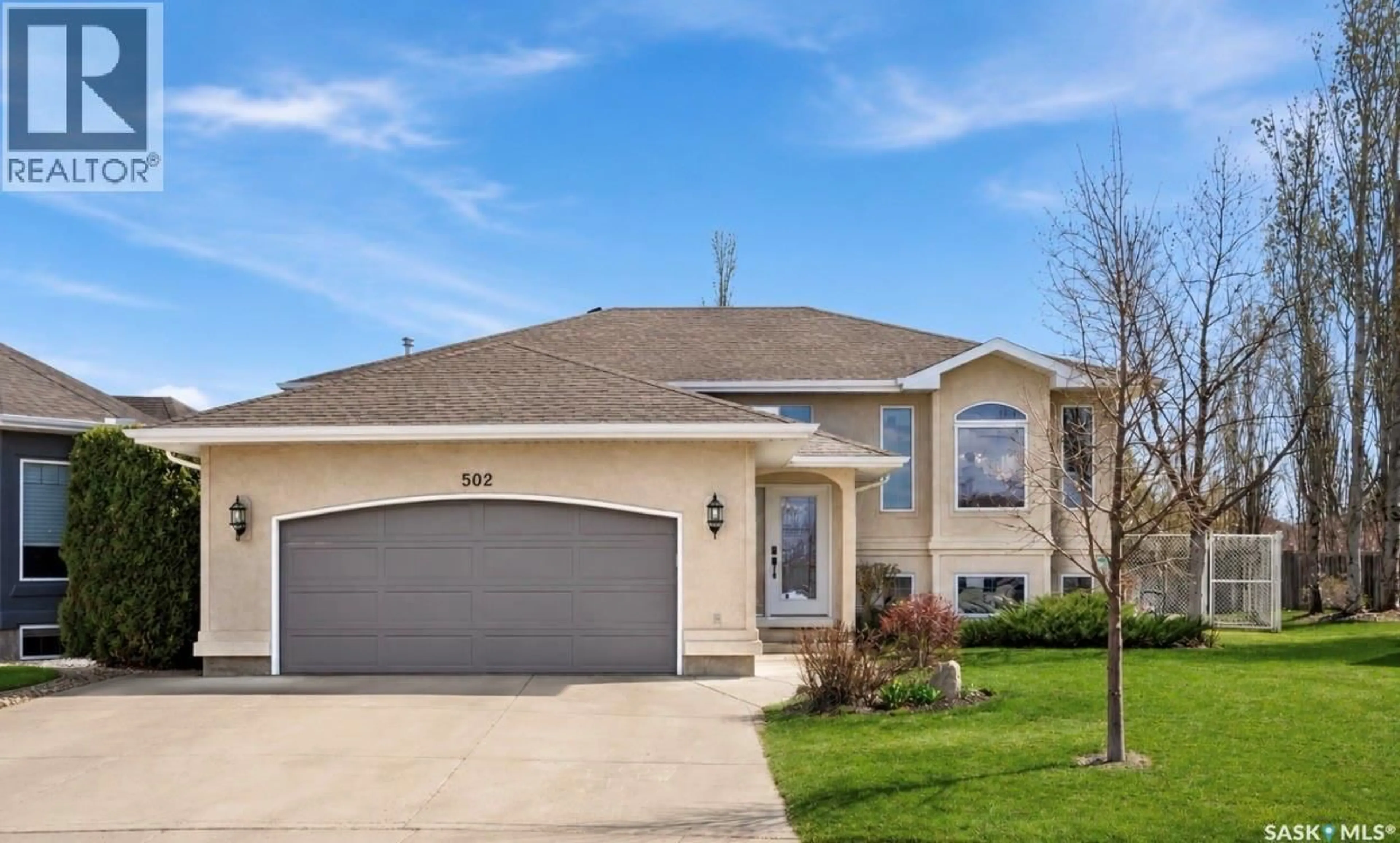 Home with vinyl exterior material, street for 502 LEMAY CRESCENT, Saskatoon Saskatchewan S7S1L1
