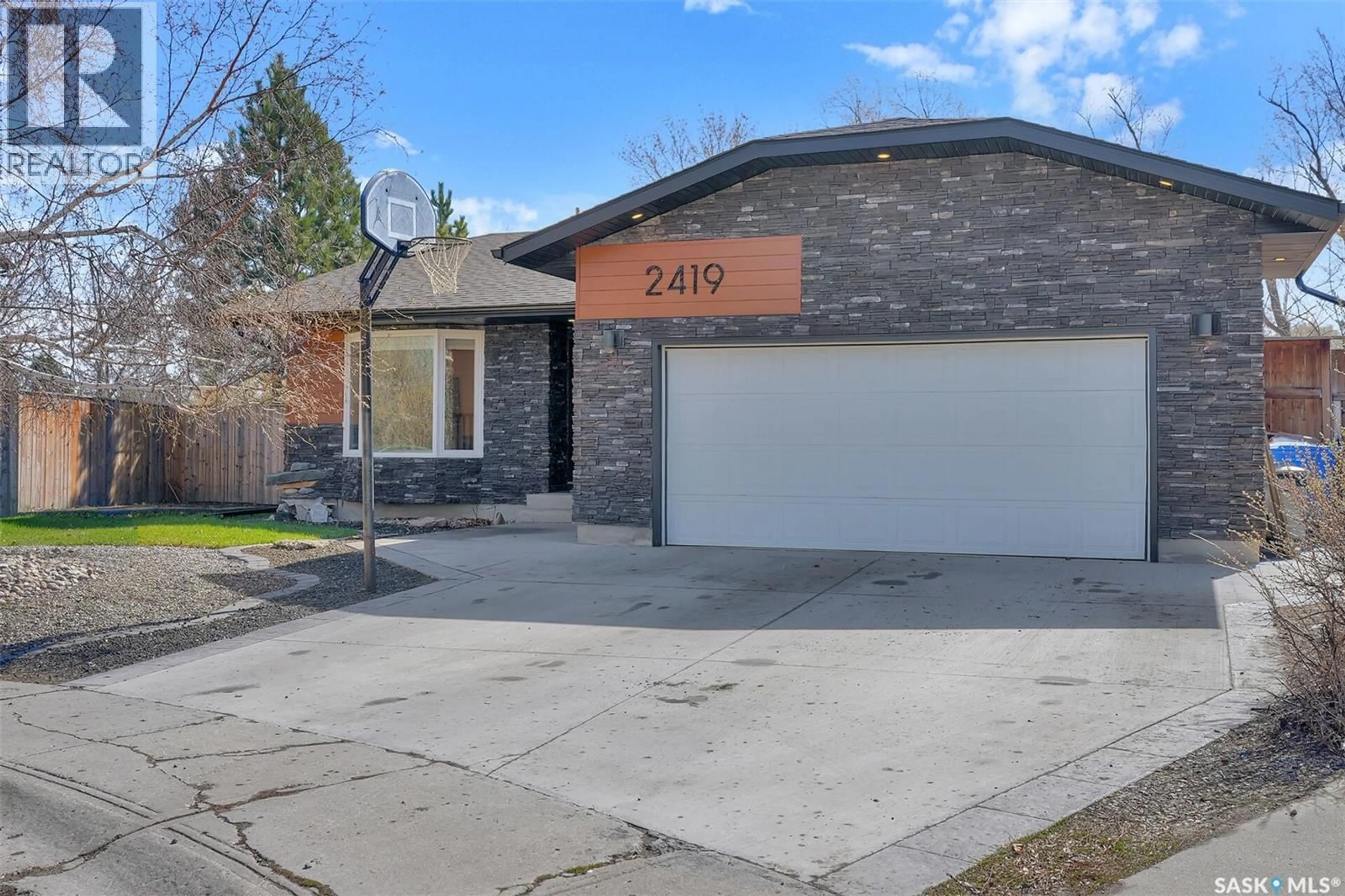Home with brick exterior material, street for E - 2419 GLAMIS PLACE, Regina Saskatchewan S4V1A5