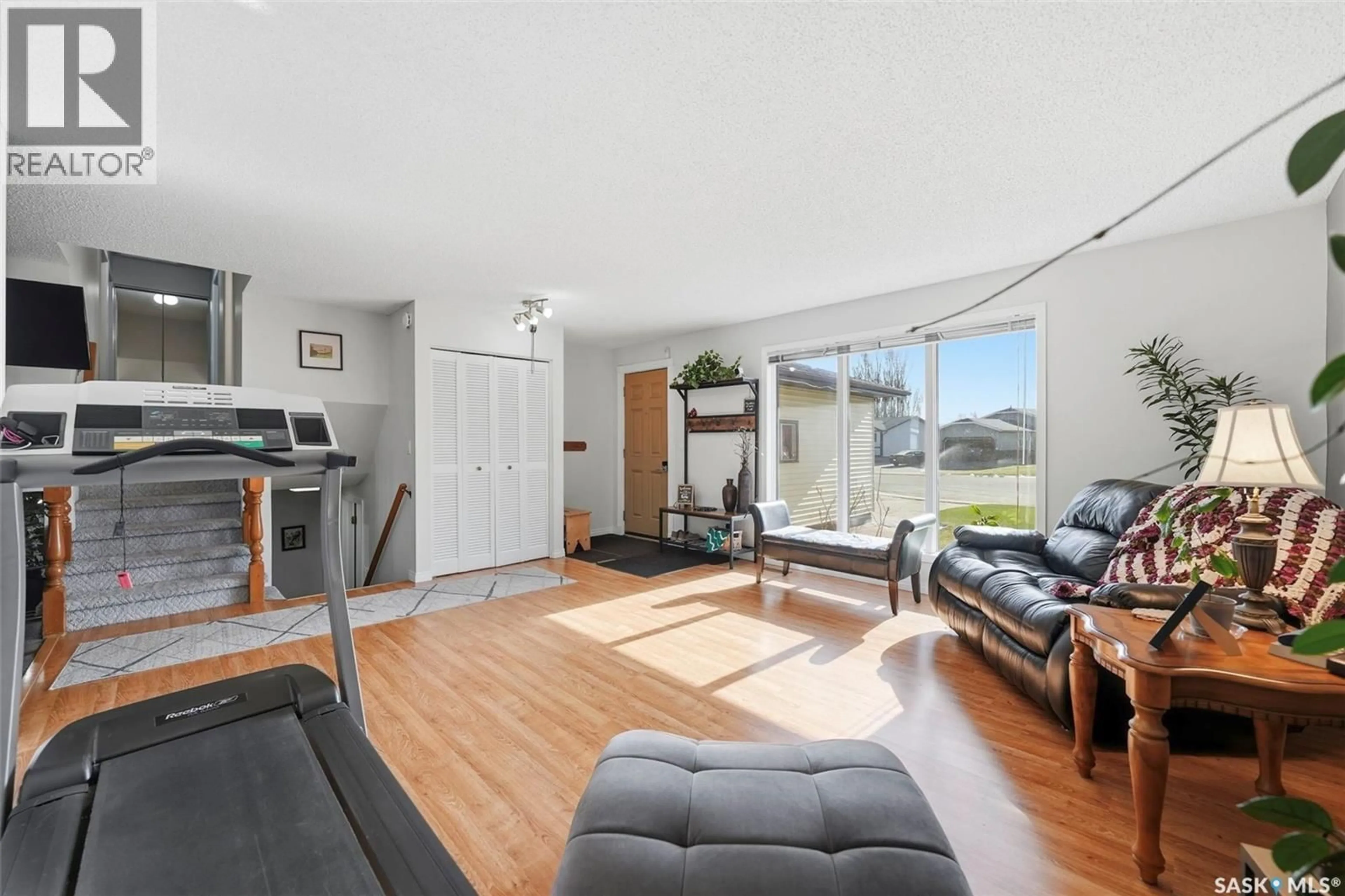 Living room with furniture, unknown for 218 WARD COURT, Saskatoon Saskatchewan S7L6Z9