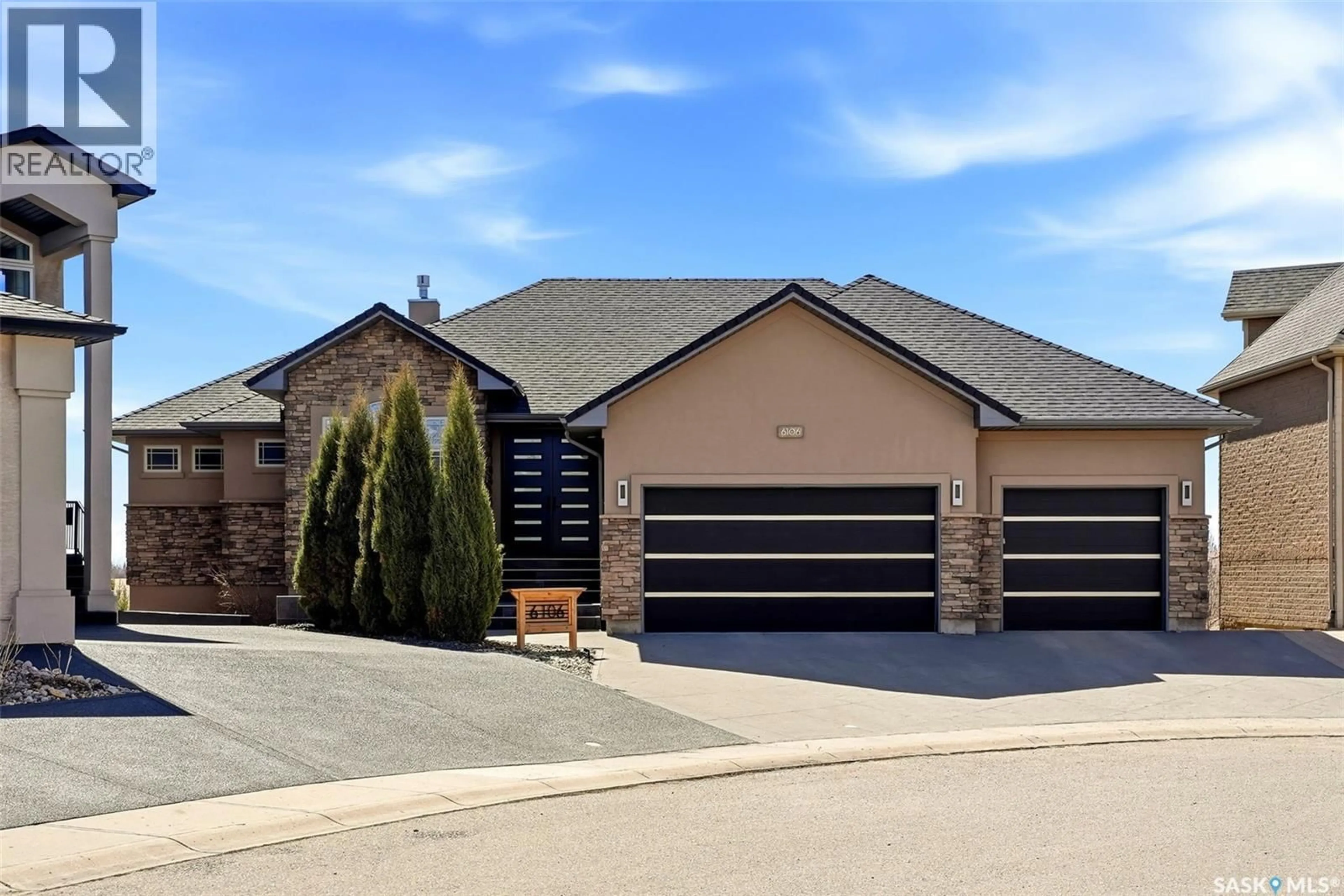 Home with brick exterior material, street for 6106 WASCANA COURT, Regina Saskatchewan S4V3E7