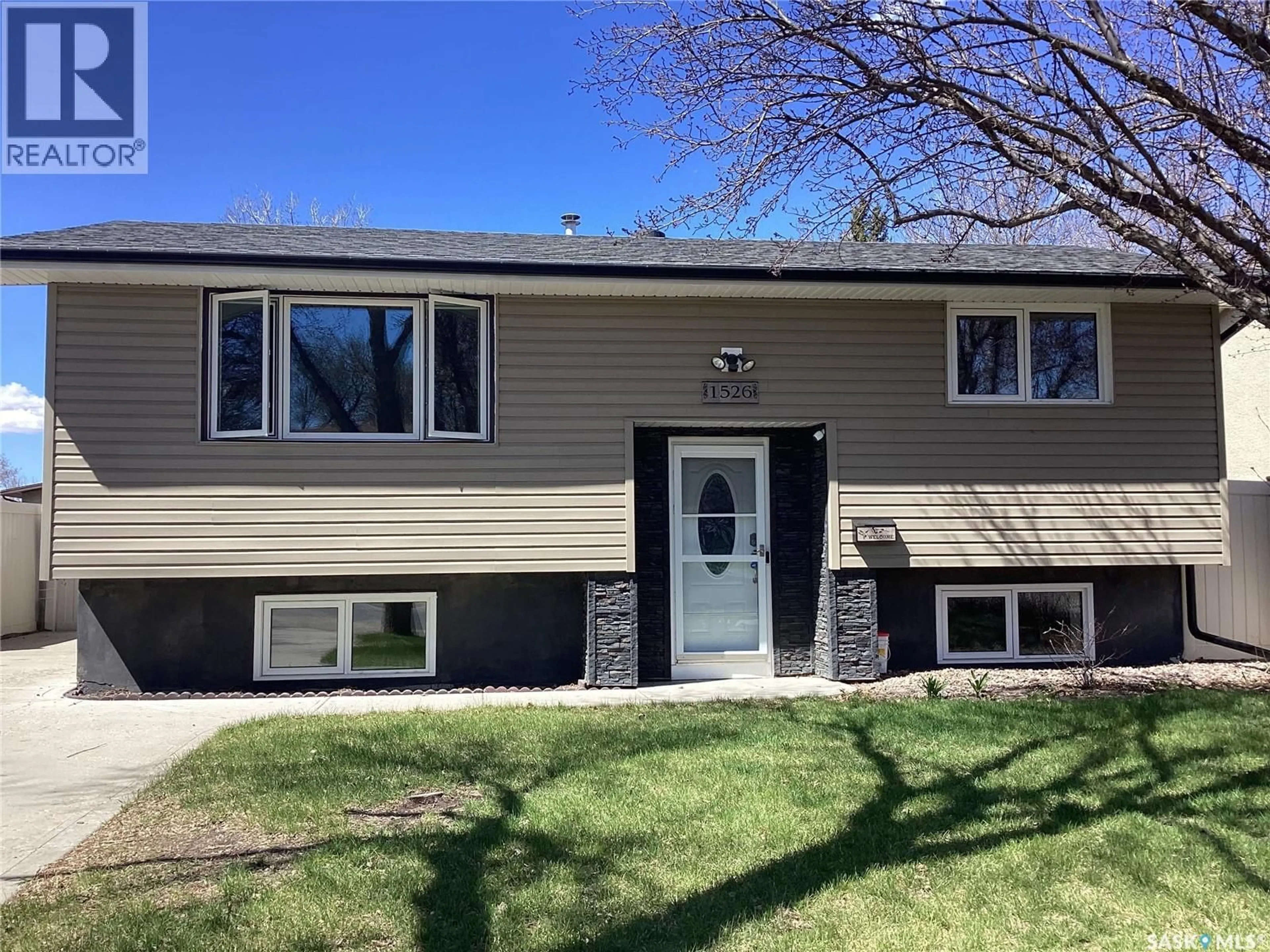 Home with vinyl exterior material, street for 1526 BROWN STREET, Regina Saskatchewan S4N4R7