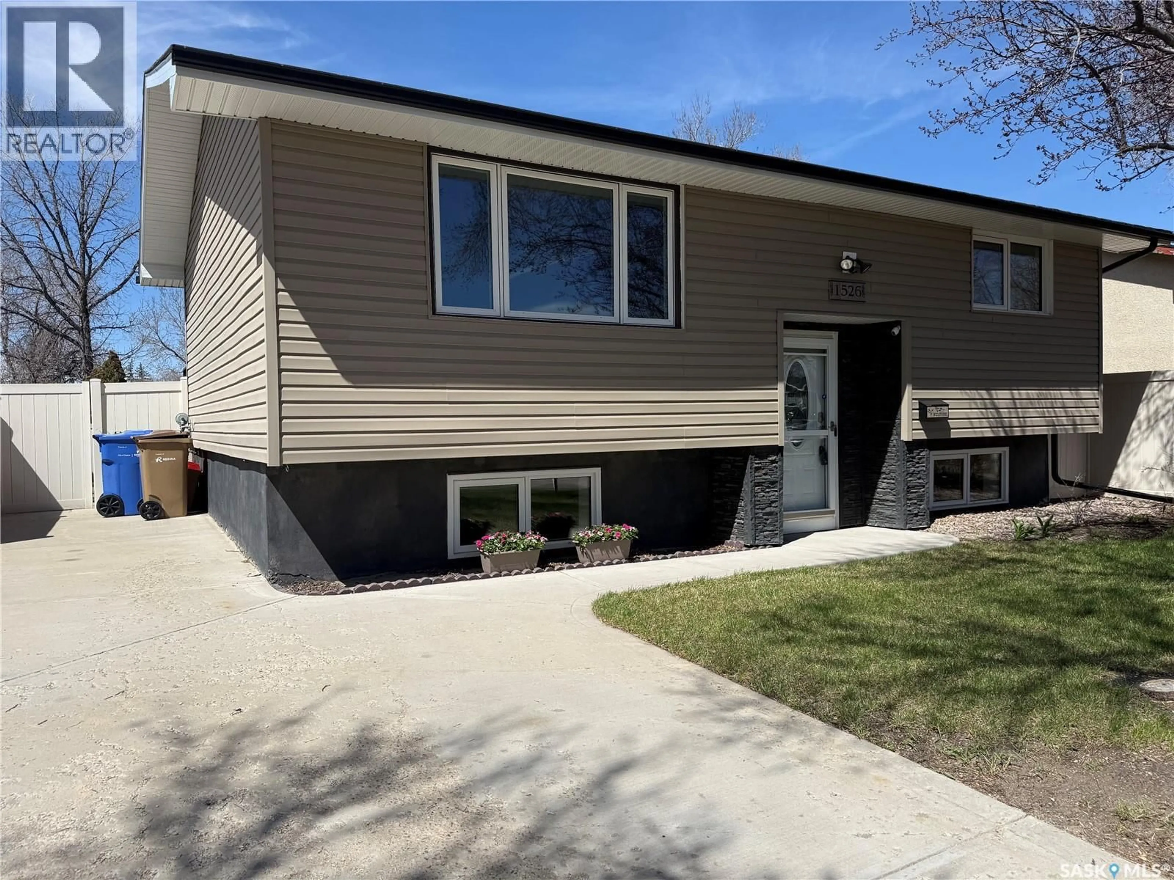 Home with vinyl exterior material, street for 1526 BROWN STREET, Regina Saskatchewan S4N4R7