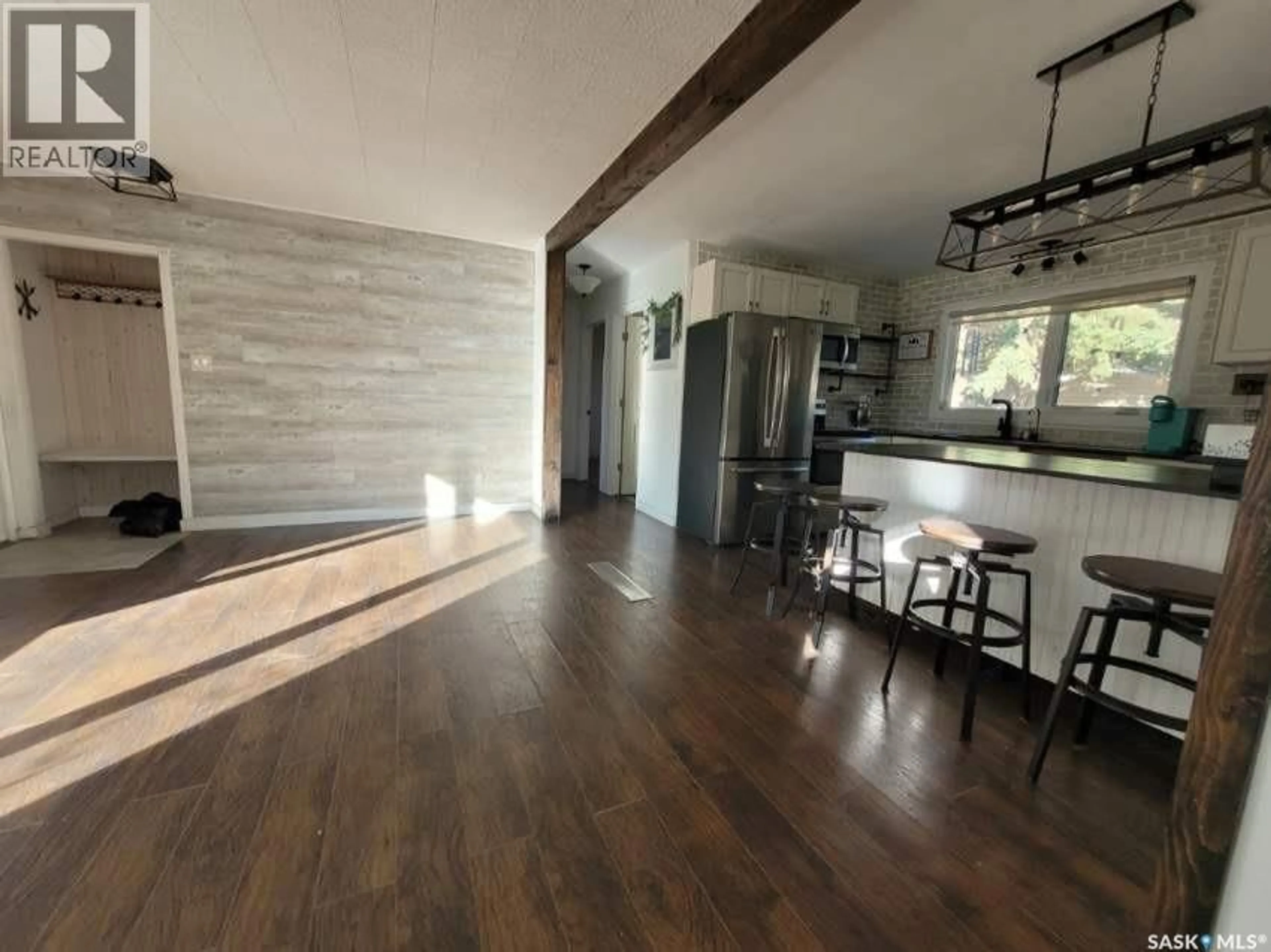 Open concept kitchen, wood/laminate floor for 113 CAIRO STREET, Wolseley Saskatchewan S0G5H0