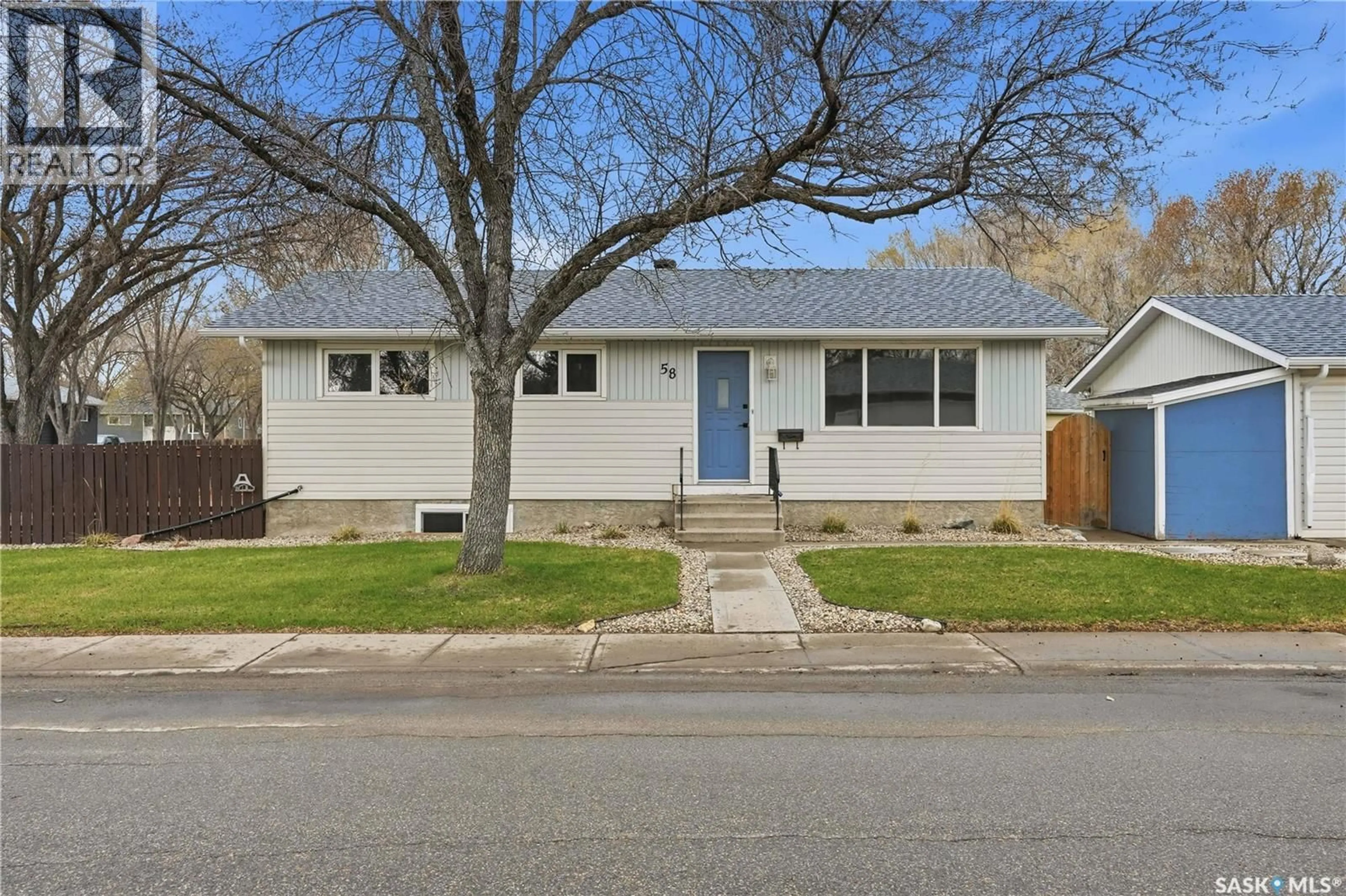 Home with vinyl exterior material, street for 58 NELLES STREET, Regina Saskatchewan S4X1M4