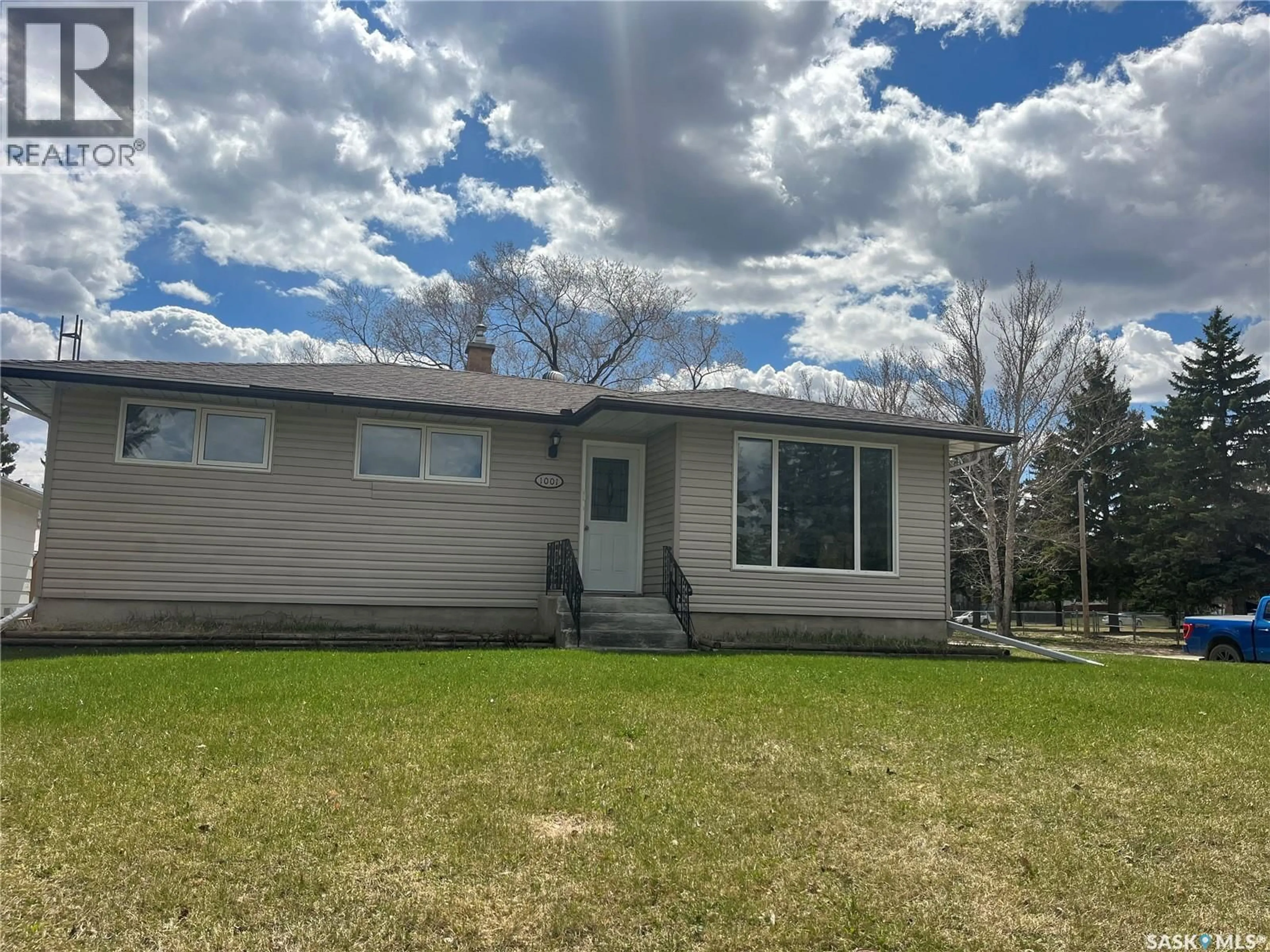 Home with vinyl exterior material, street for 1001 CARLTON DRIVE, Esterhazy Saskatchewan S0A0X0