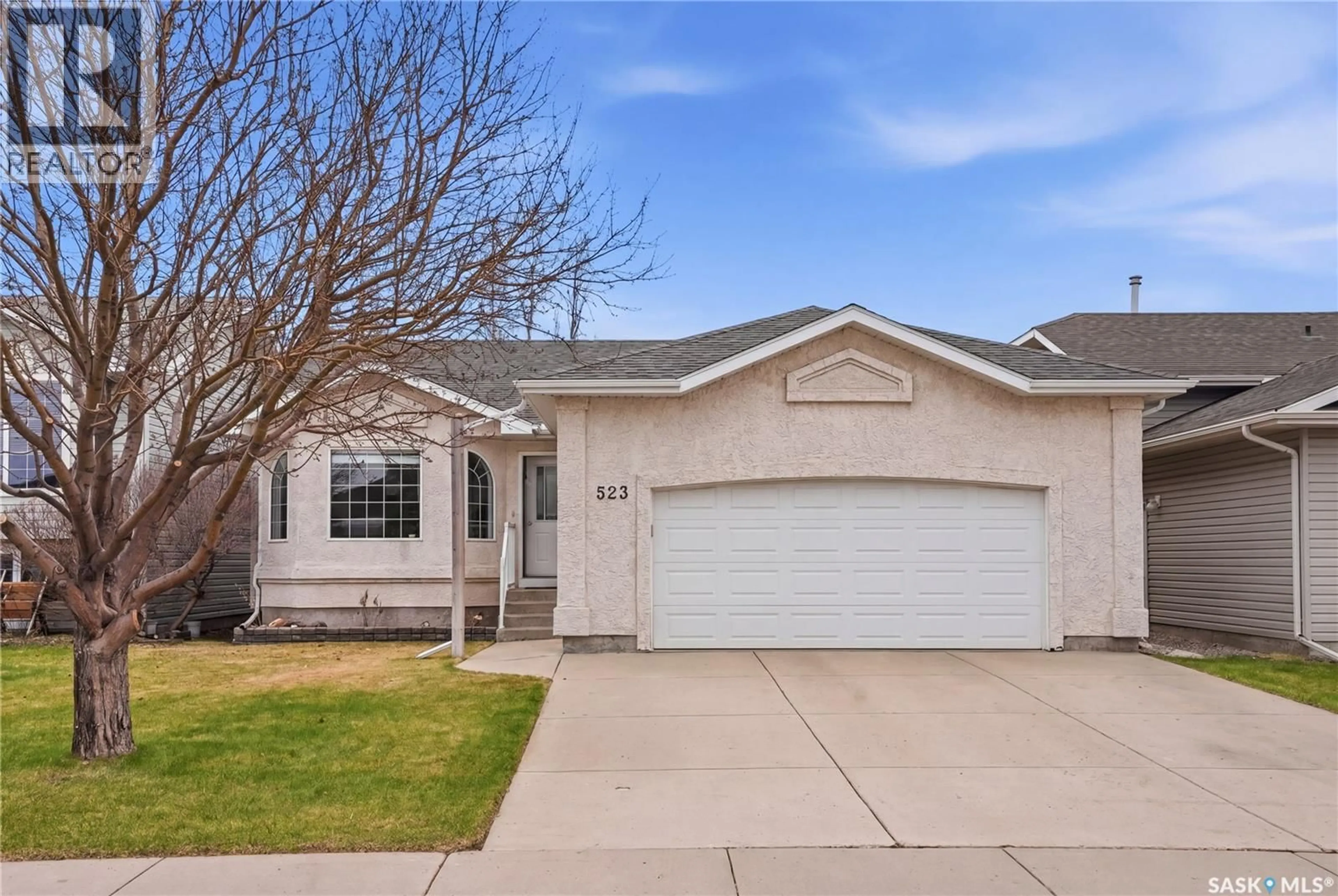 Home with vinyl exterior material, street for 523 POBRAN CRESCENT, Saskatoon Saskatchewan S7S1L5