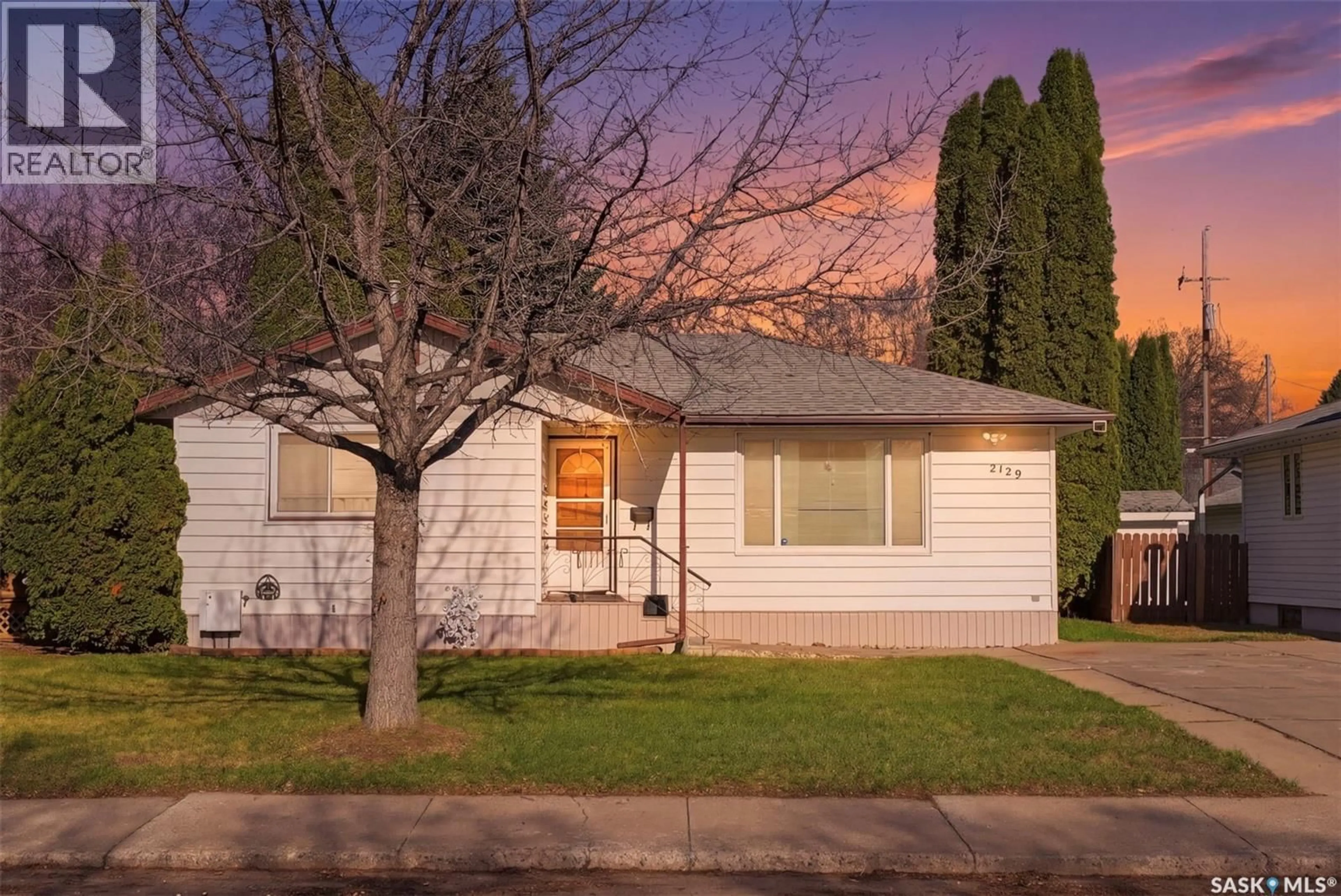 Home with vinyl exterior material, street for 2129 CAIRNS AVENUE, Saskatoon Saskatchewan S7J1T5