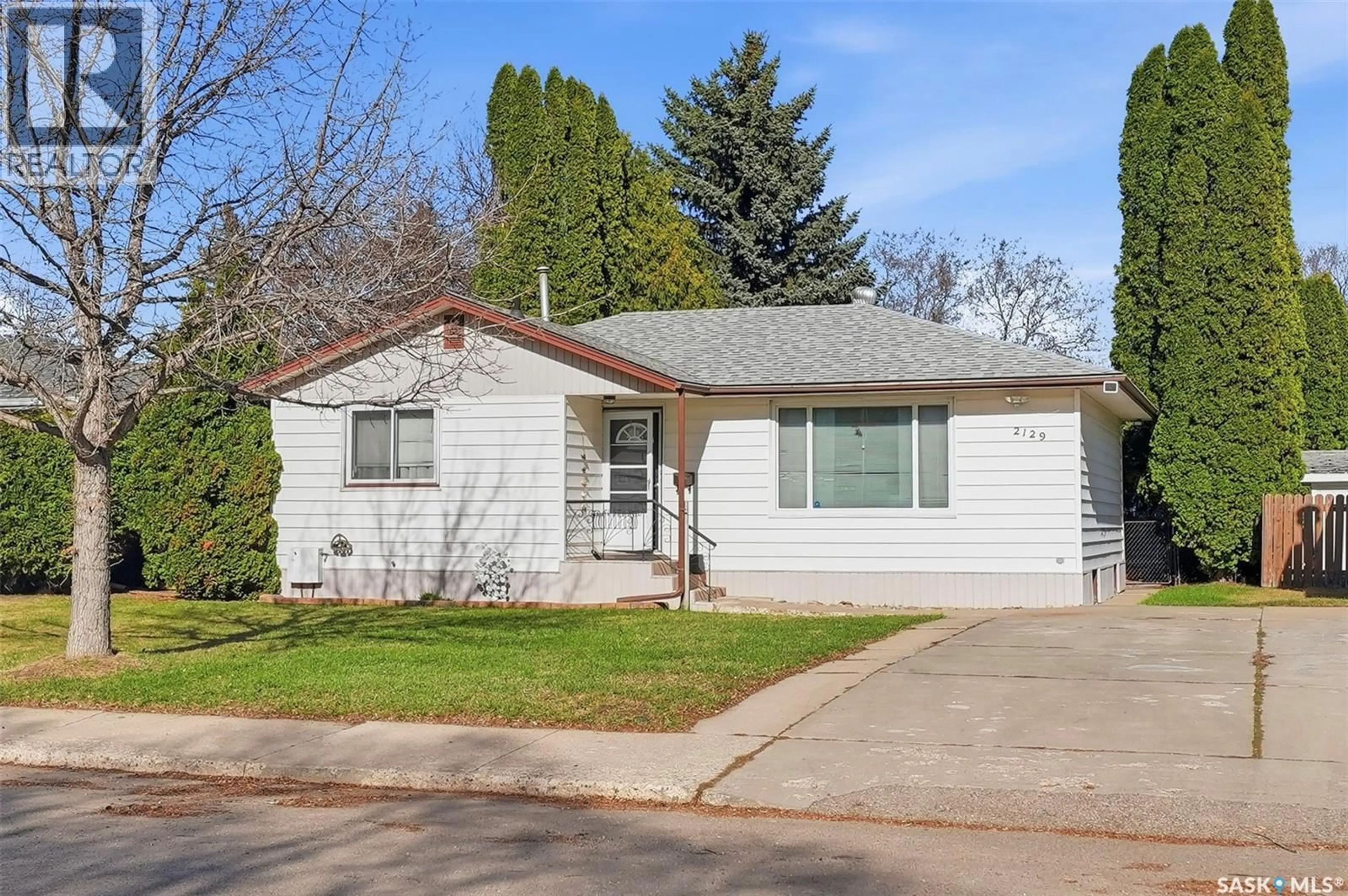 Home with vinyl exterior material, street for 2129 CAIRNS AVENUE, Saskatoon Saskatchewan S7J1T5