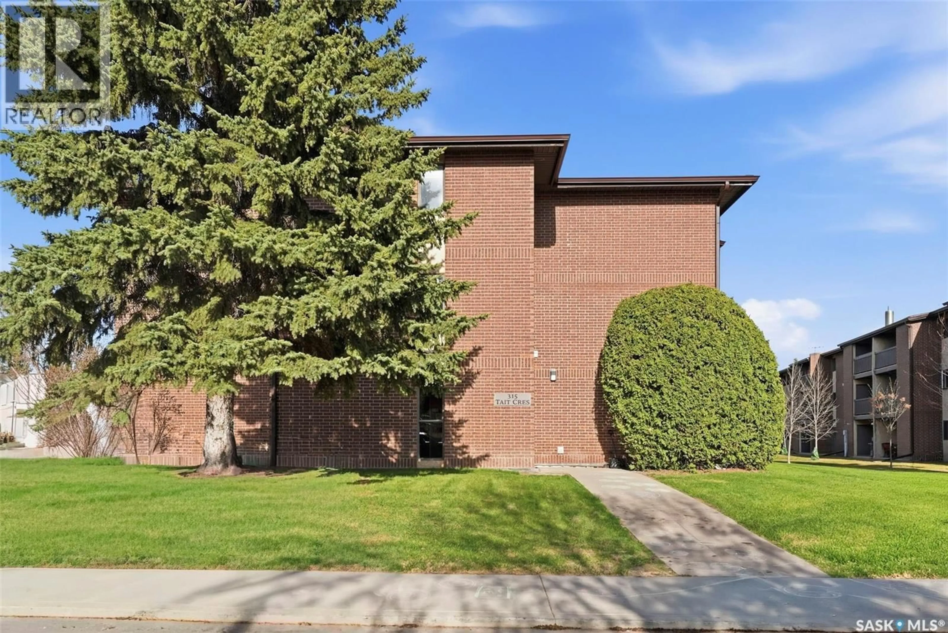 Home with brick exterior material, building for 105 - 315 TAIT CRESCENT, Saskatoon Saskatchewan S7H5L6
