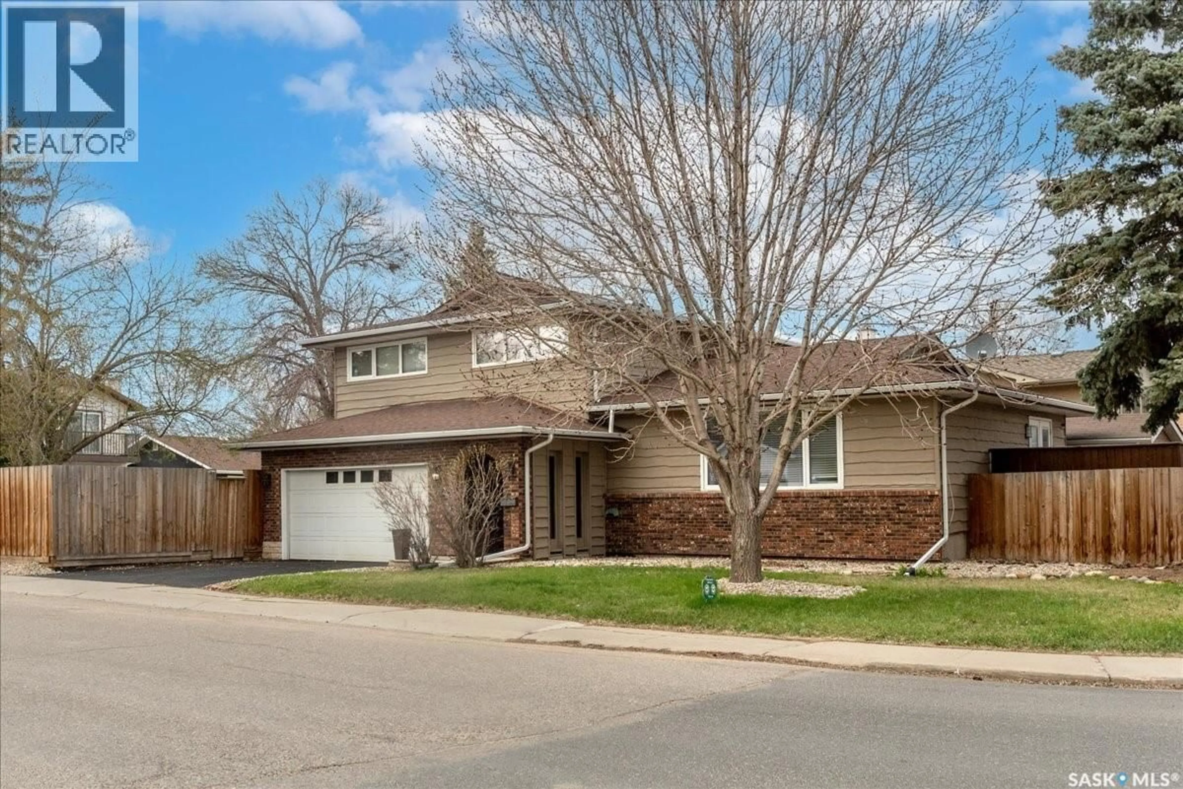 Home with brick exterior material, street for 182 LINCOLN DRIVE, Regina Saskatchewan S4S6R5