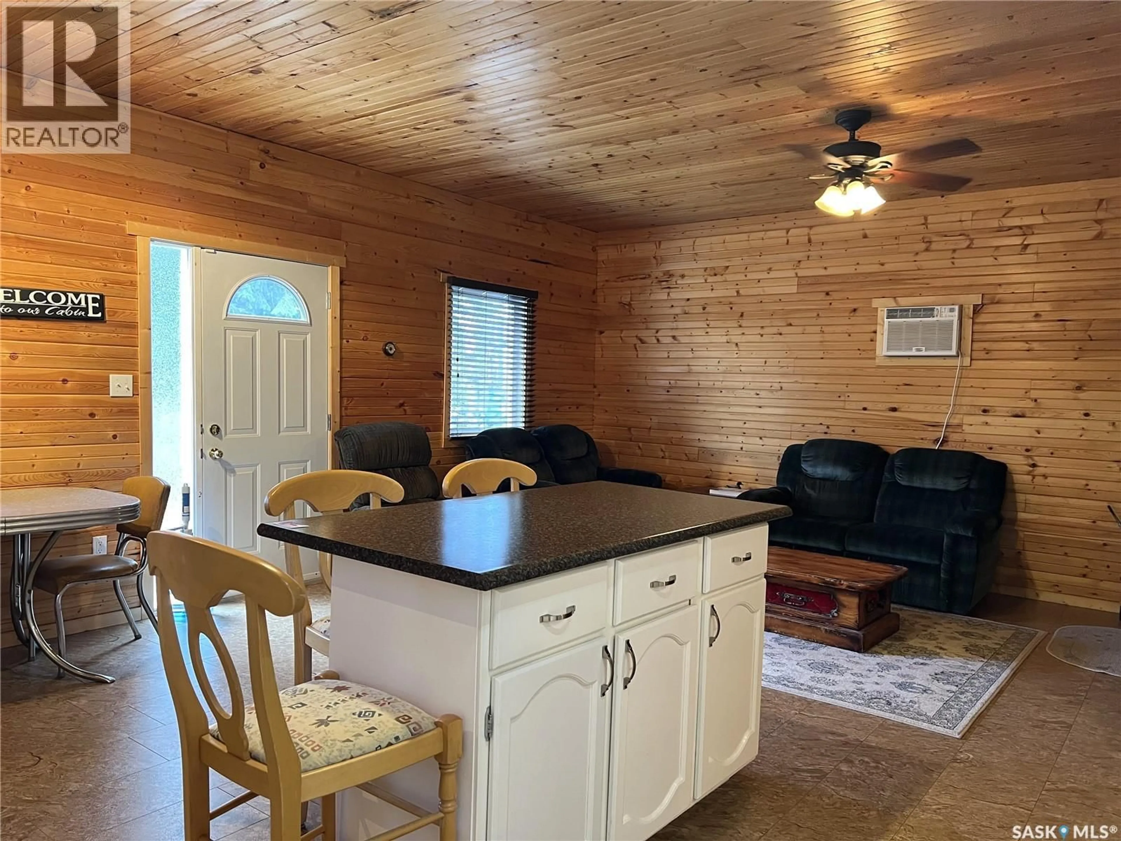 Open concept kitchen, wood/laminate floor for 418 SOUTH POINT PLACE, Green Lake Saskatchewan S0M1B0