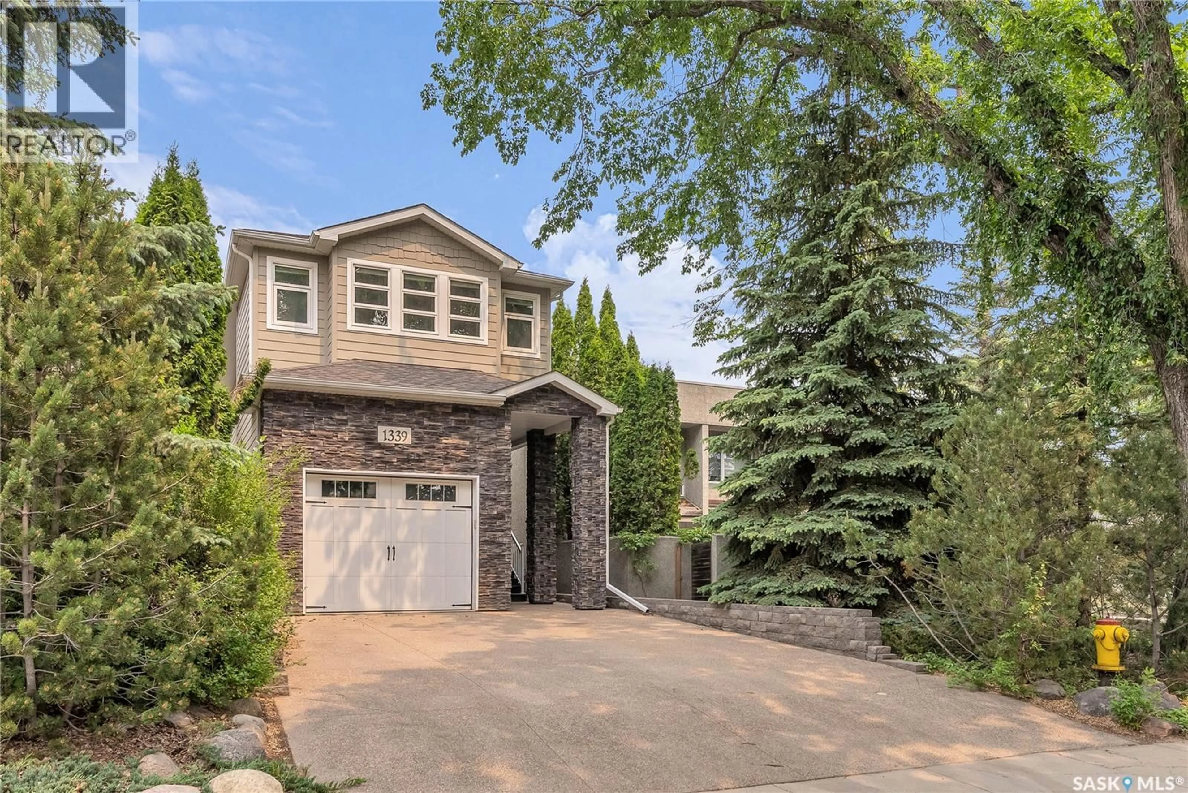 Home with brick exterior material, street for 1339 OSLER STREET, Saskatoon Saskatchewan S7N0V1