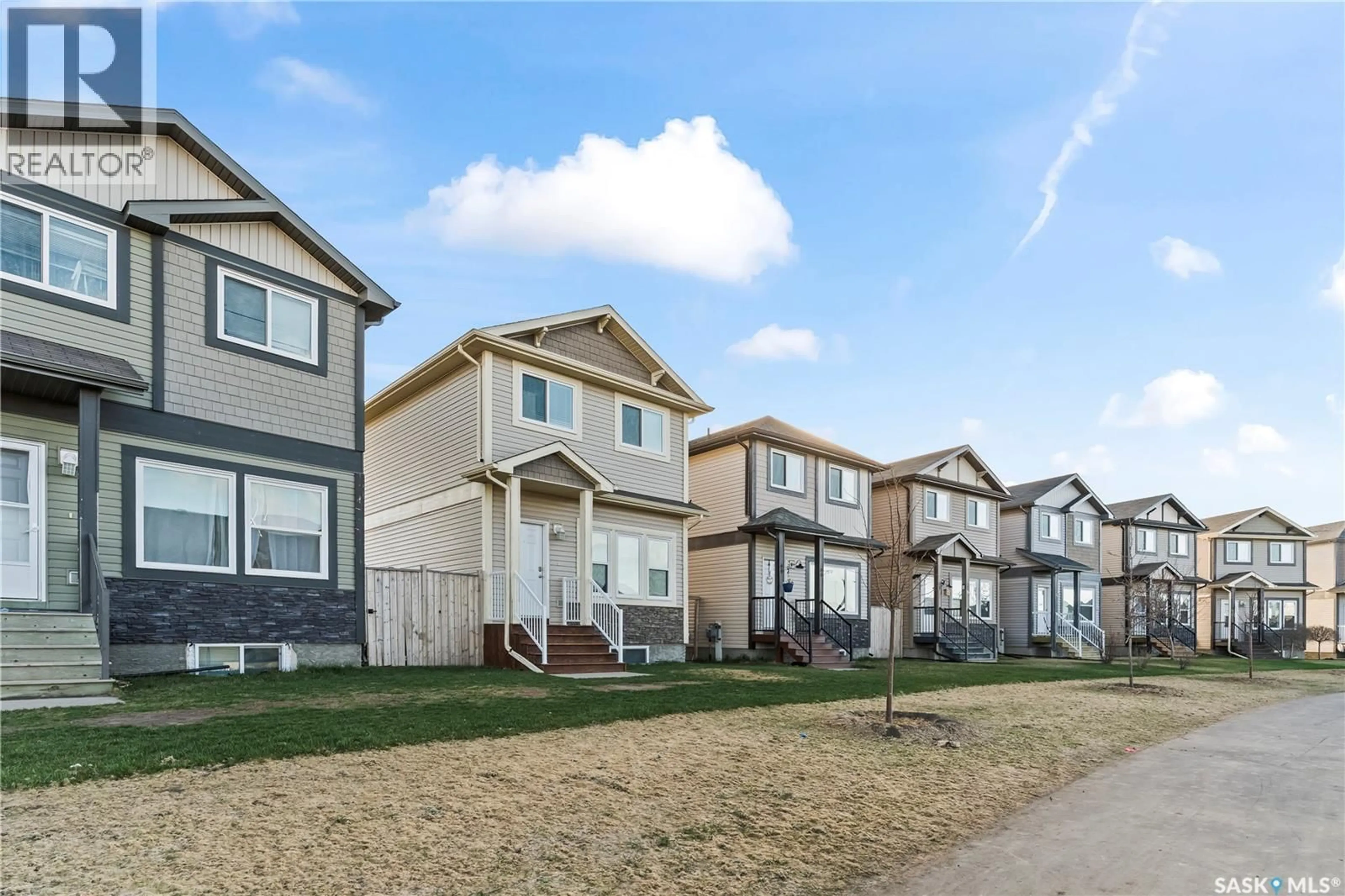 Home with vinyl exterior material, street for E - 68 235 ROSEWOOD BOULEVARD, Saskatoon Saskatchewan S7V0J2