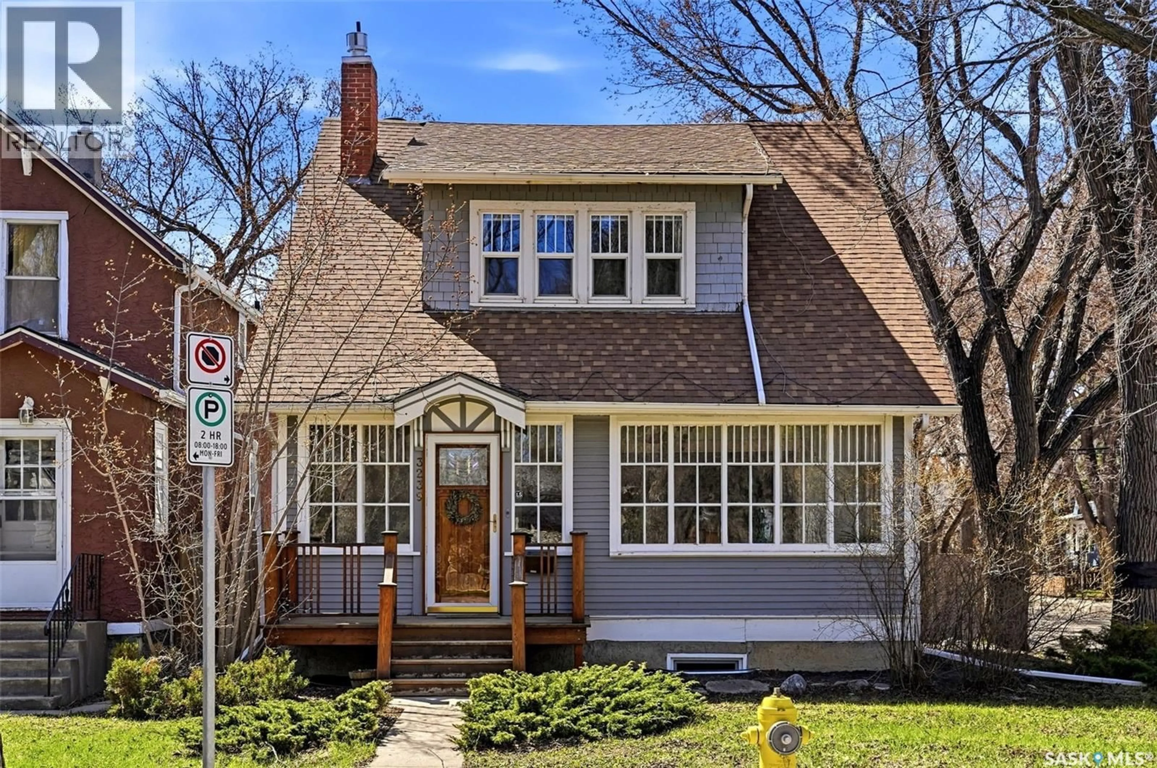 Home with brick exterior material, street for 3239 VICTORIA AVENUE, Regina Saskatchewan S4T1L5