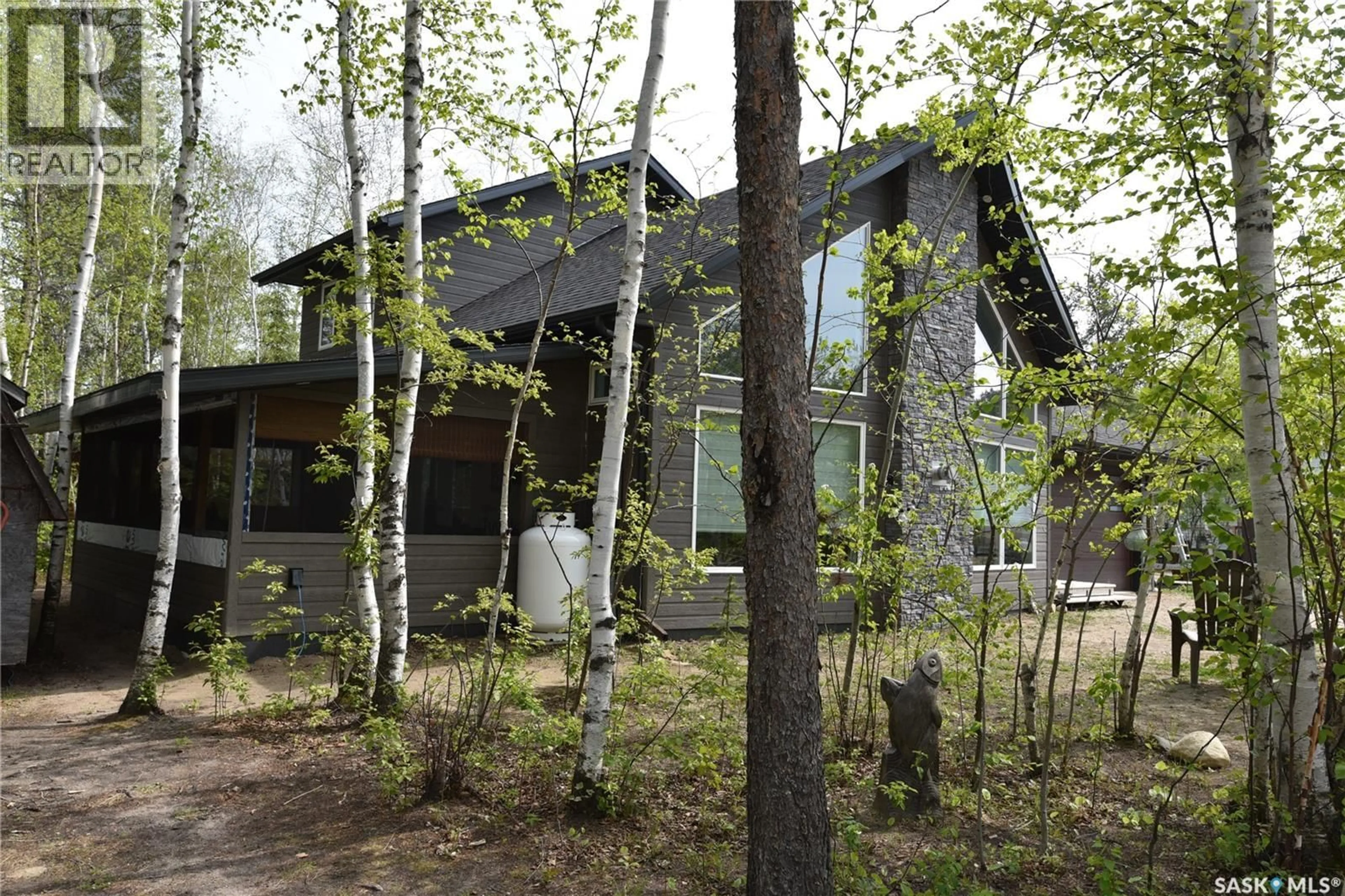 Home with brick exterior material, forest/trees view for 213 BIRCH AVENUE, Tobin Lake Saskatchewan S0J3B0