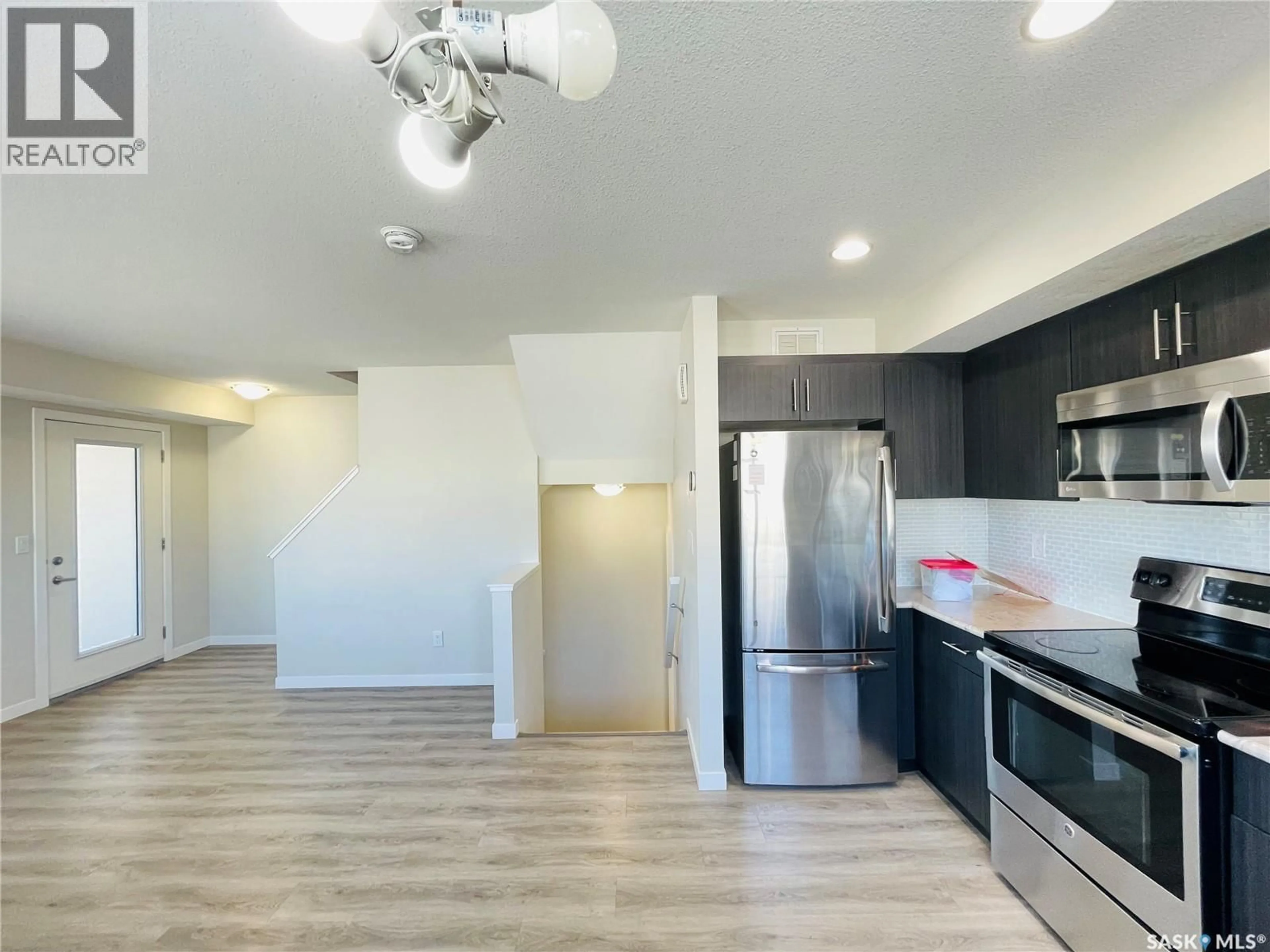 Open concept kitchen, unknown for 104 - 3367 GREEN POPPY STREET, Regina Saskatchewan S4V3P6