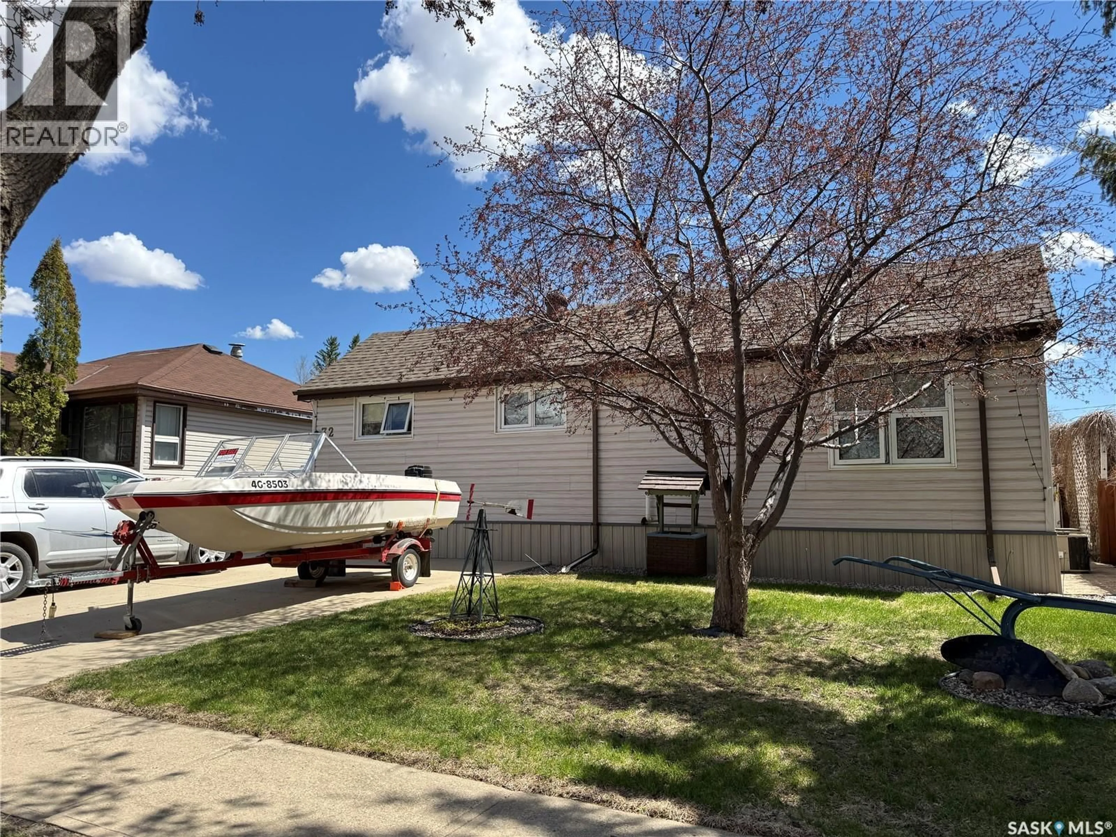 A pic from outside/outdoor area/front of a property/back of a property/a pic from drone, street for 72 11TH STREET, Weyburn Saskatchewan S4H1J3