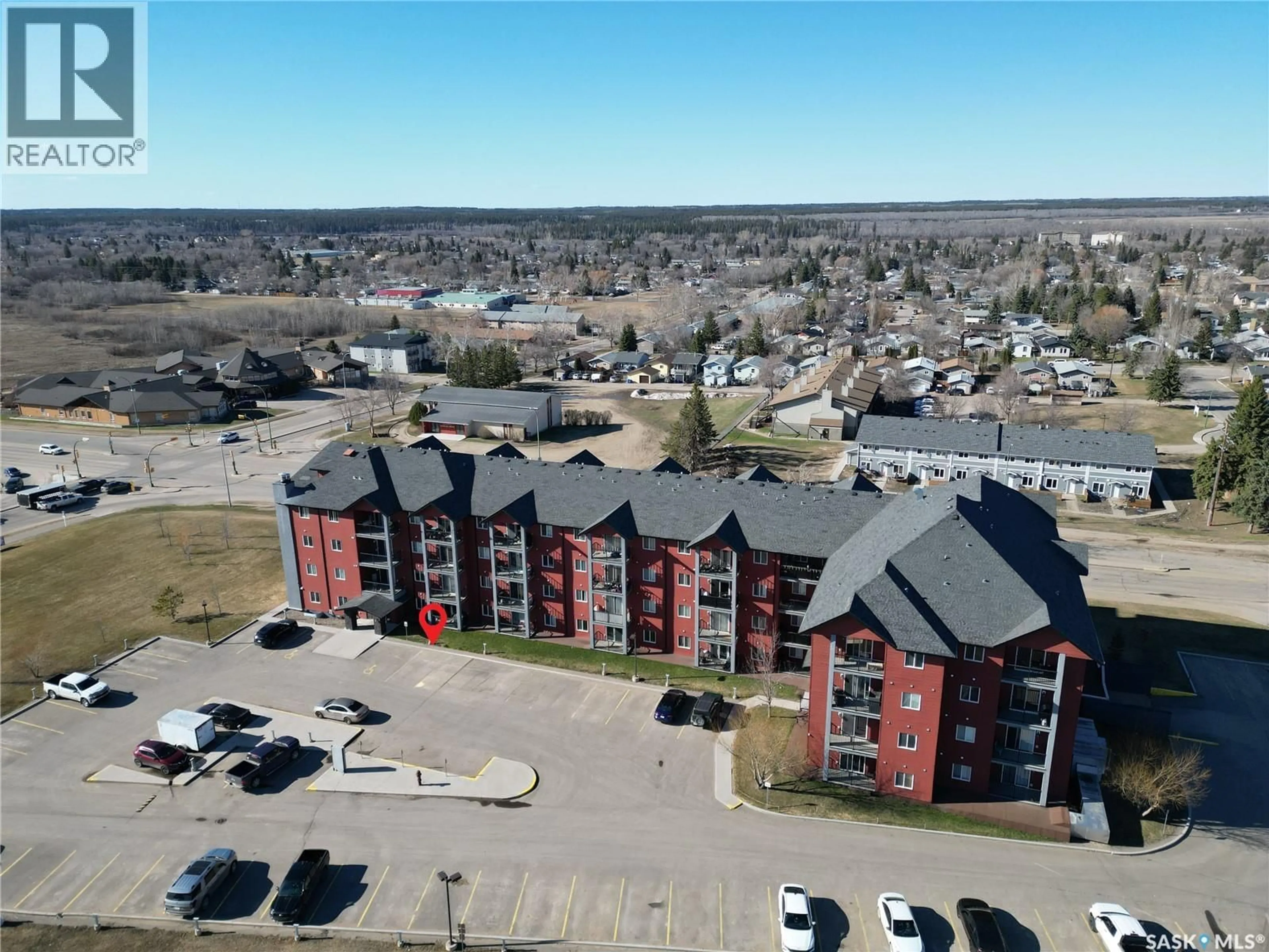 A pic from outside/outdoor area/front of a property/back of a property/a pic from drone, building for 102 - 1501 15TH STREET, Prince Albert Saskatchewan S6V7C3