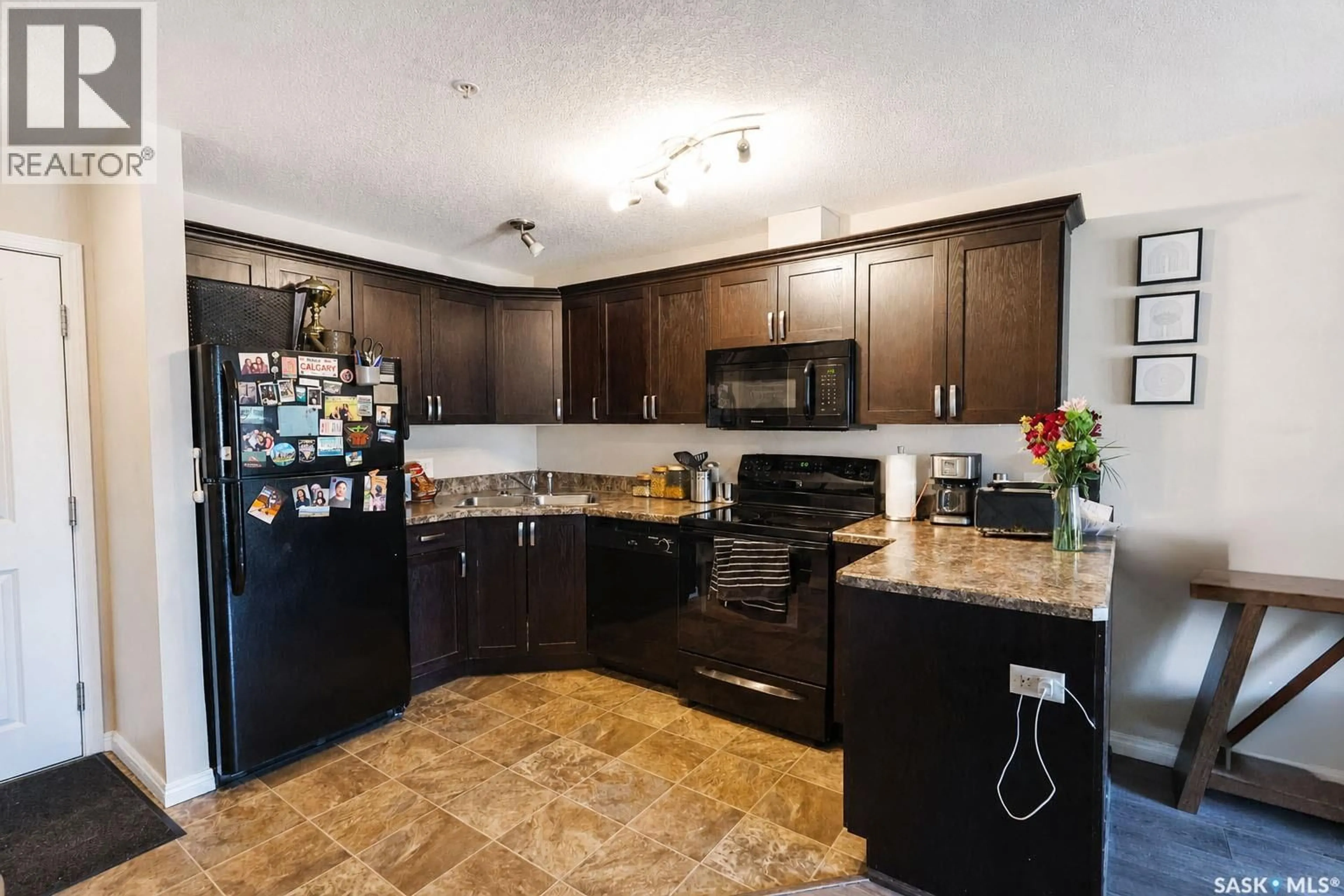 Standard kitchen, ceramic/tile floor for 102 - 1501 15TH STREET, Prince Albert Saskatchewan S6V7C3