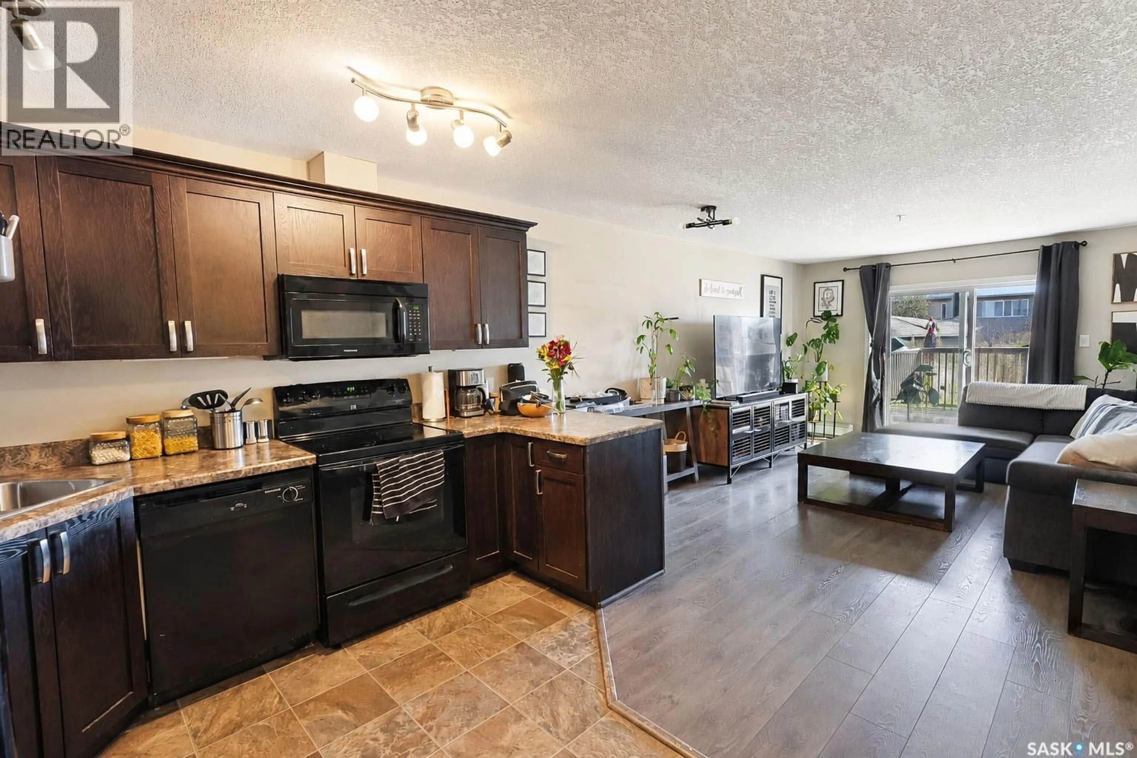 Open concept kitchen, unknown for 102 - 1501 15TH STREET, Prince Albert Saskatchewan S6V7C3
