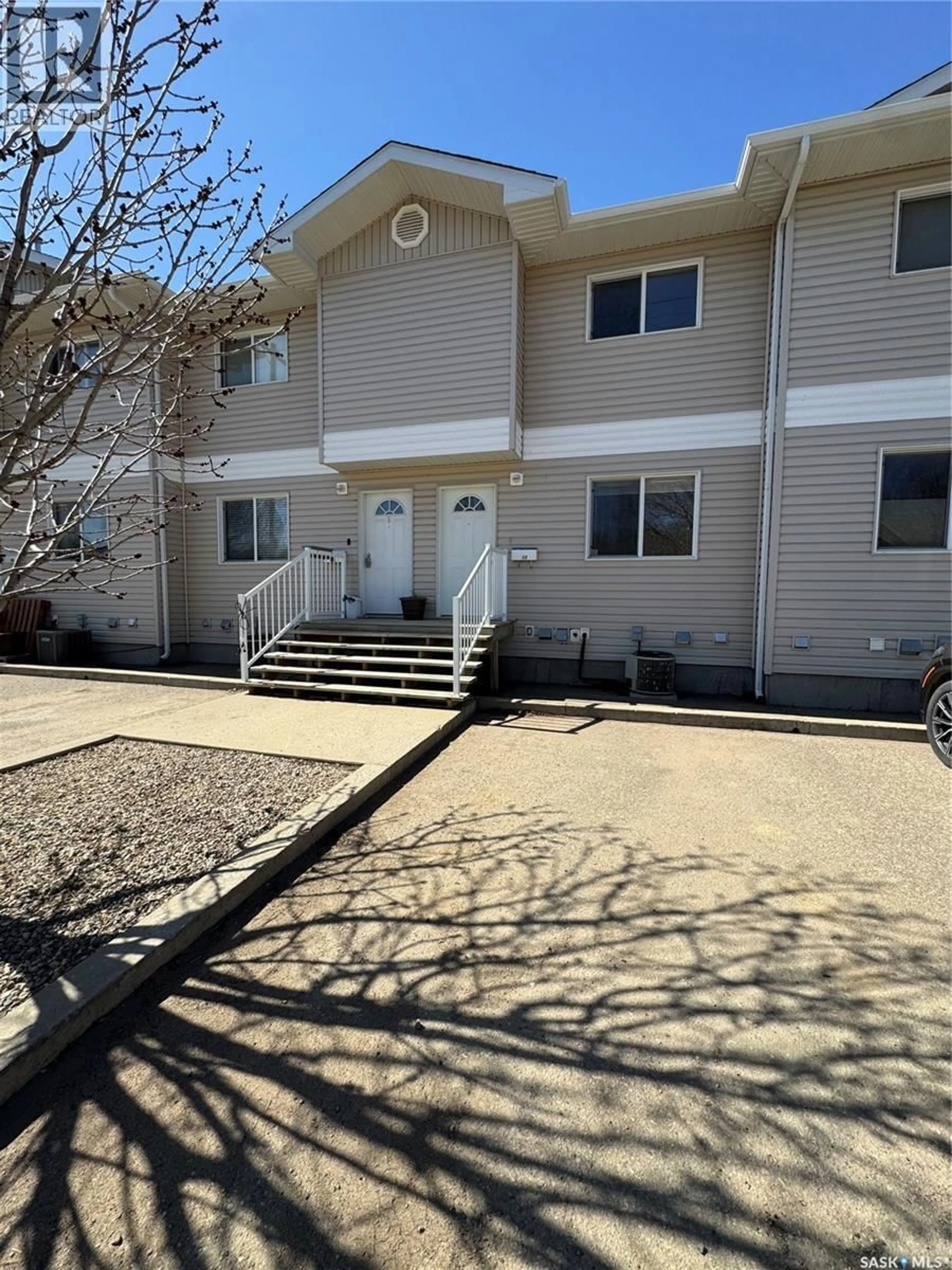 A pic from outside/outdoor area/front of a property/back of a property/a pic from drone, street for 13 - 1437 1ST STREET, Estevan Saskatchewan S4A2X5