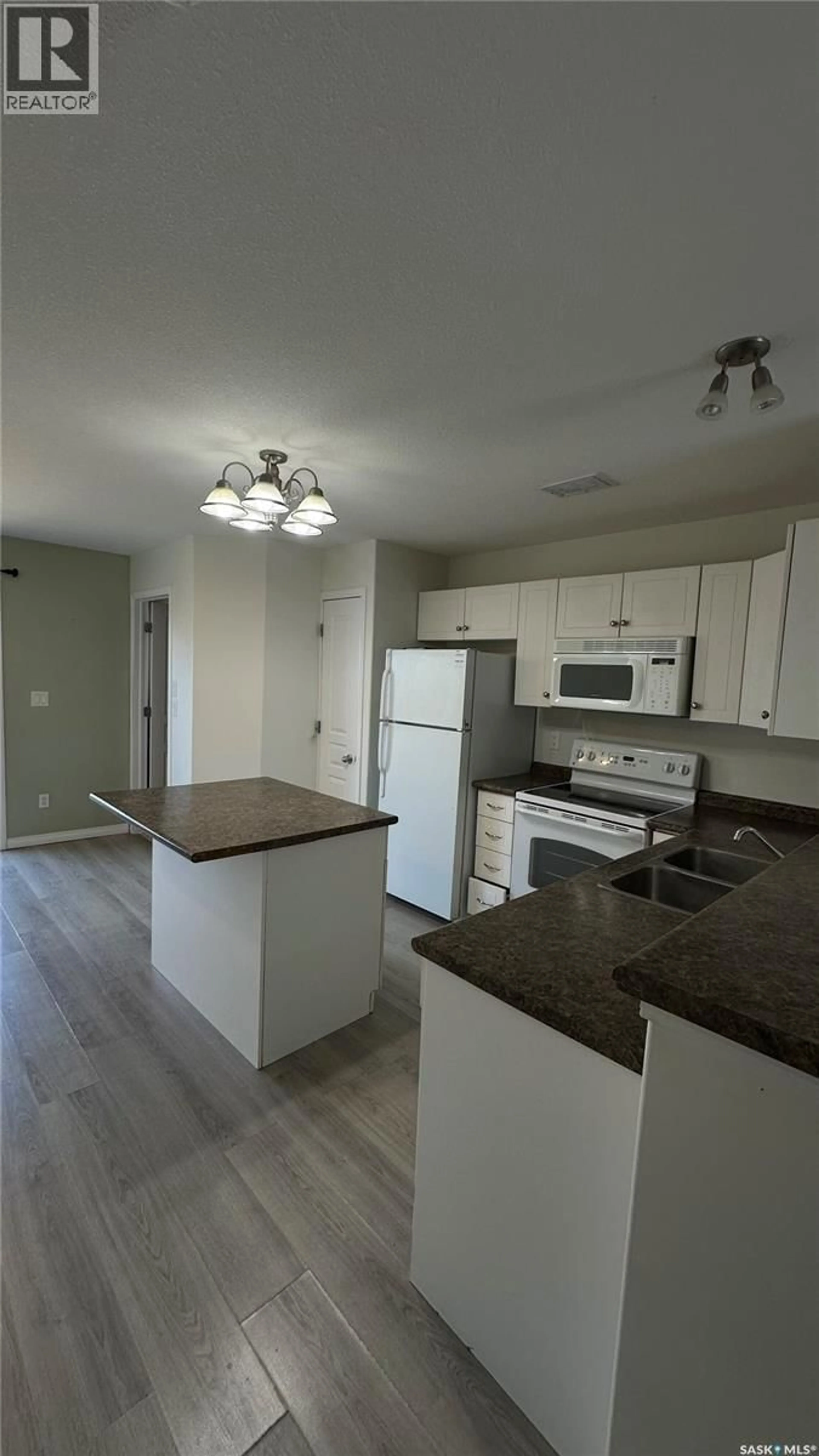 Standard kitchen, wood/laminate floor for 13 - 1437 1ST STREET, Estevan Saskatchewan S4A2X5