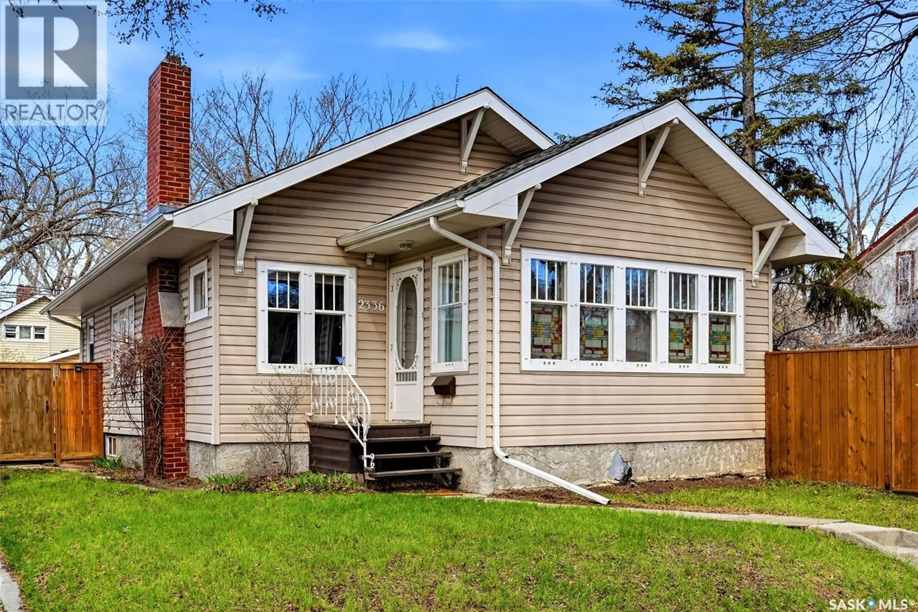 Home with vinyl exterior material, street for 2336 WINNIPEG STREET, Regina Saskatchewan S4P1H3