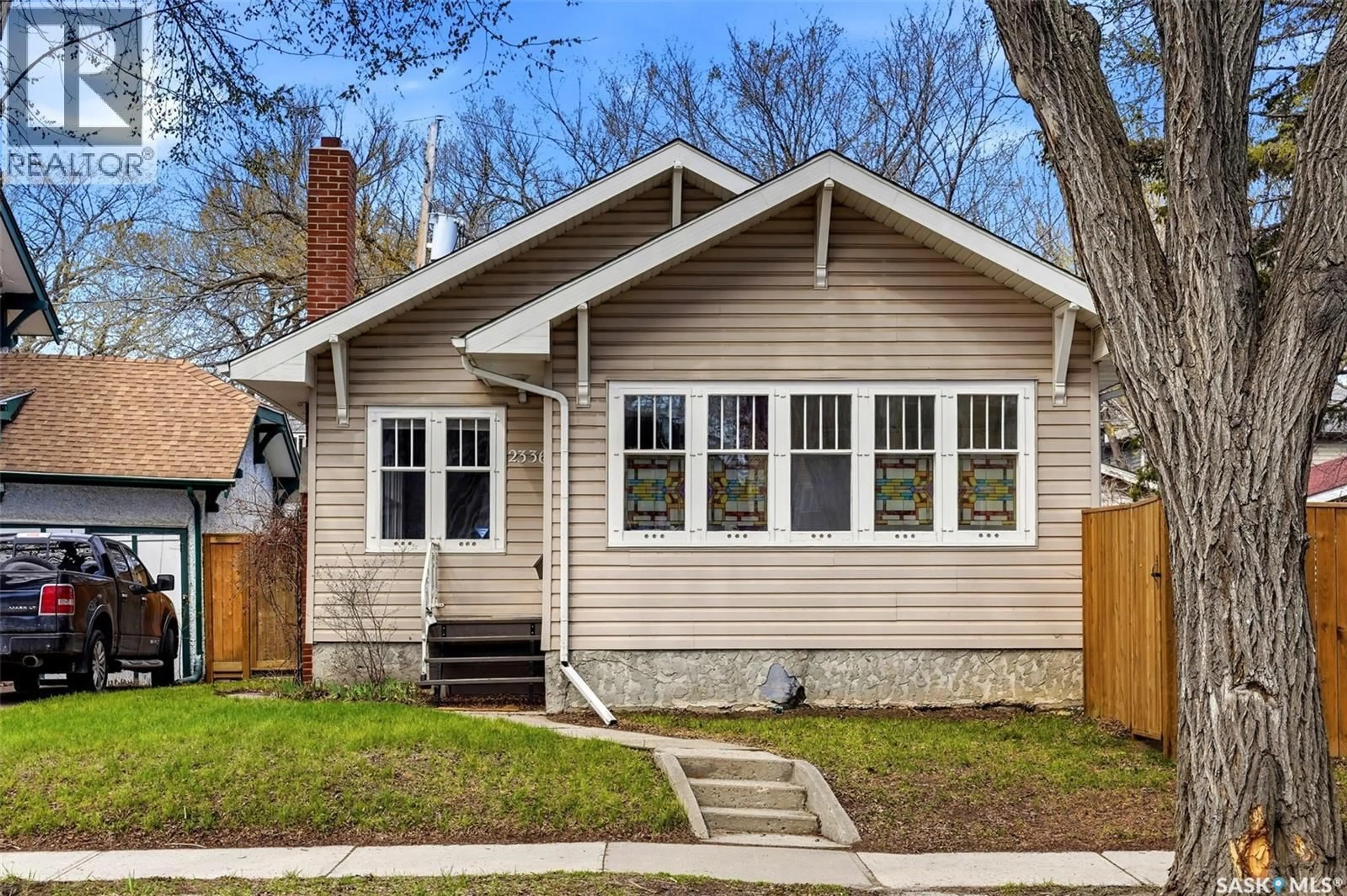 Home with vinyl exterior material, street for 2336 WINNIPEG STREET, Regina Saskatchewan S4P1H3