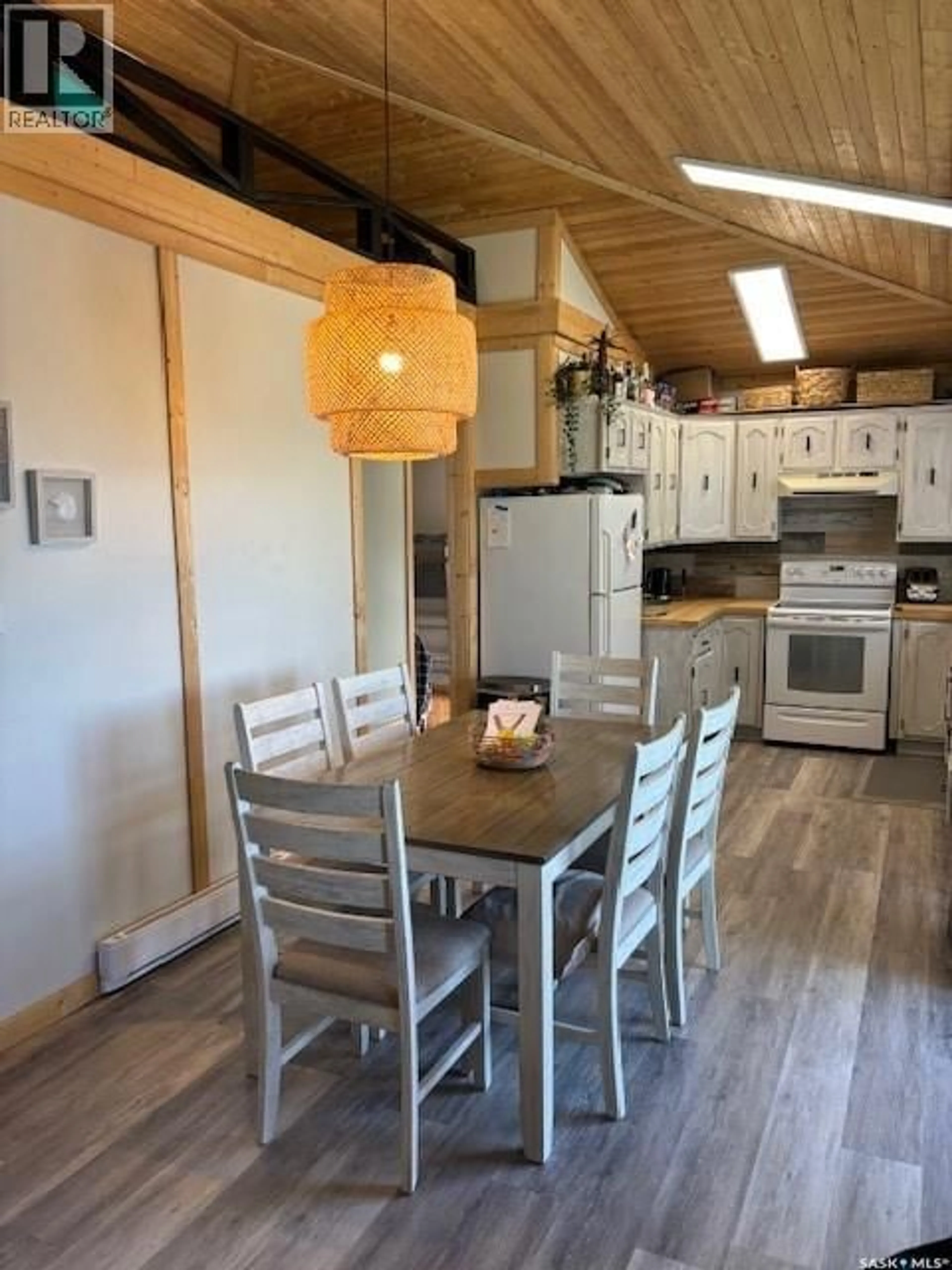 Open concept kitchen, wood/laminate floor for 169 OLDROYD DRIVE, Good Spirit Lake Saskatchewan S0A0L0