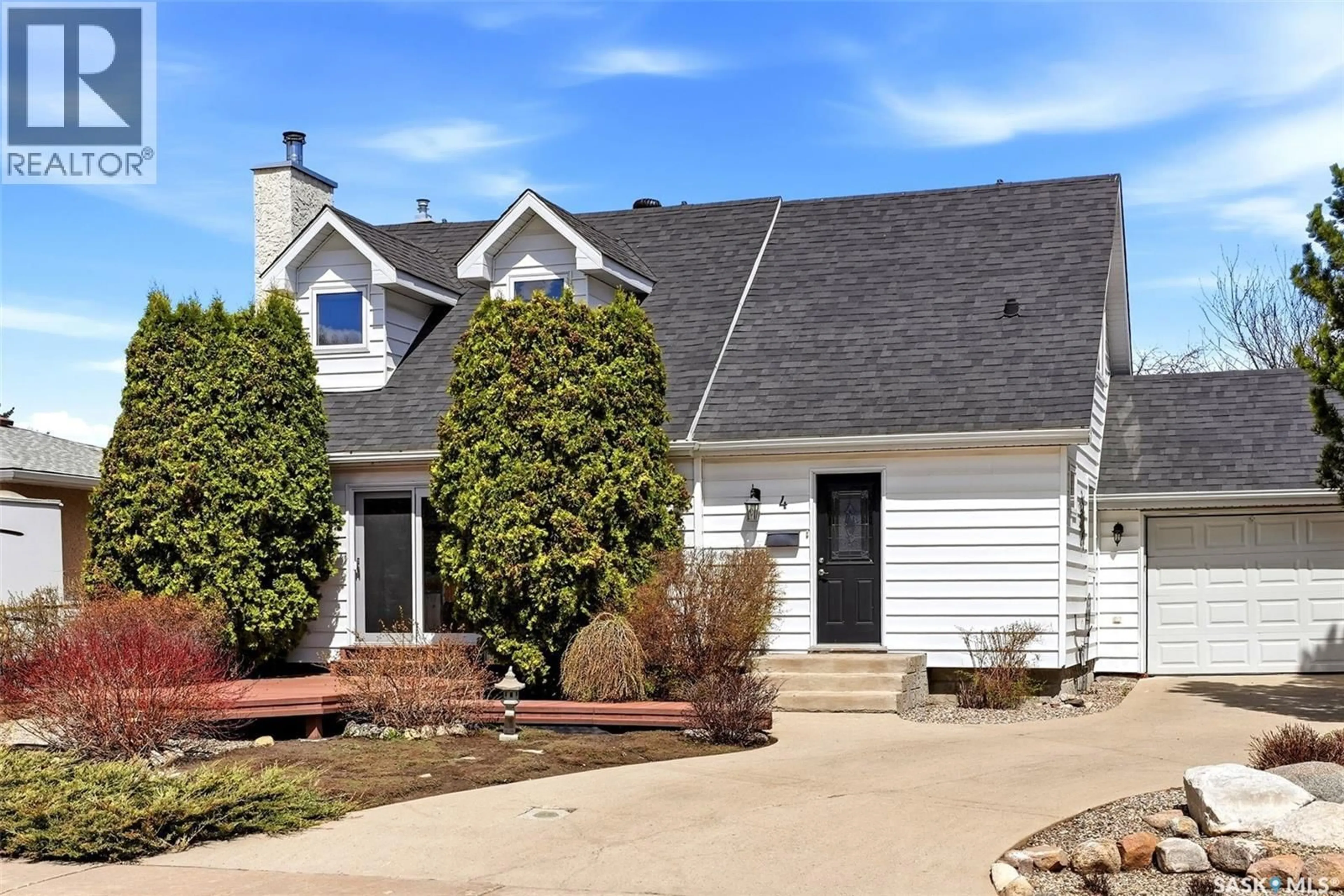 Home with vinyl exterior material, street for 4 BANNISTER AVENUE, Regina Saskatchewan S4R5K9