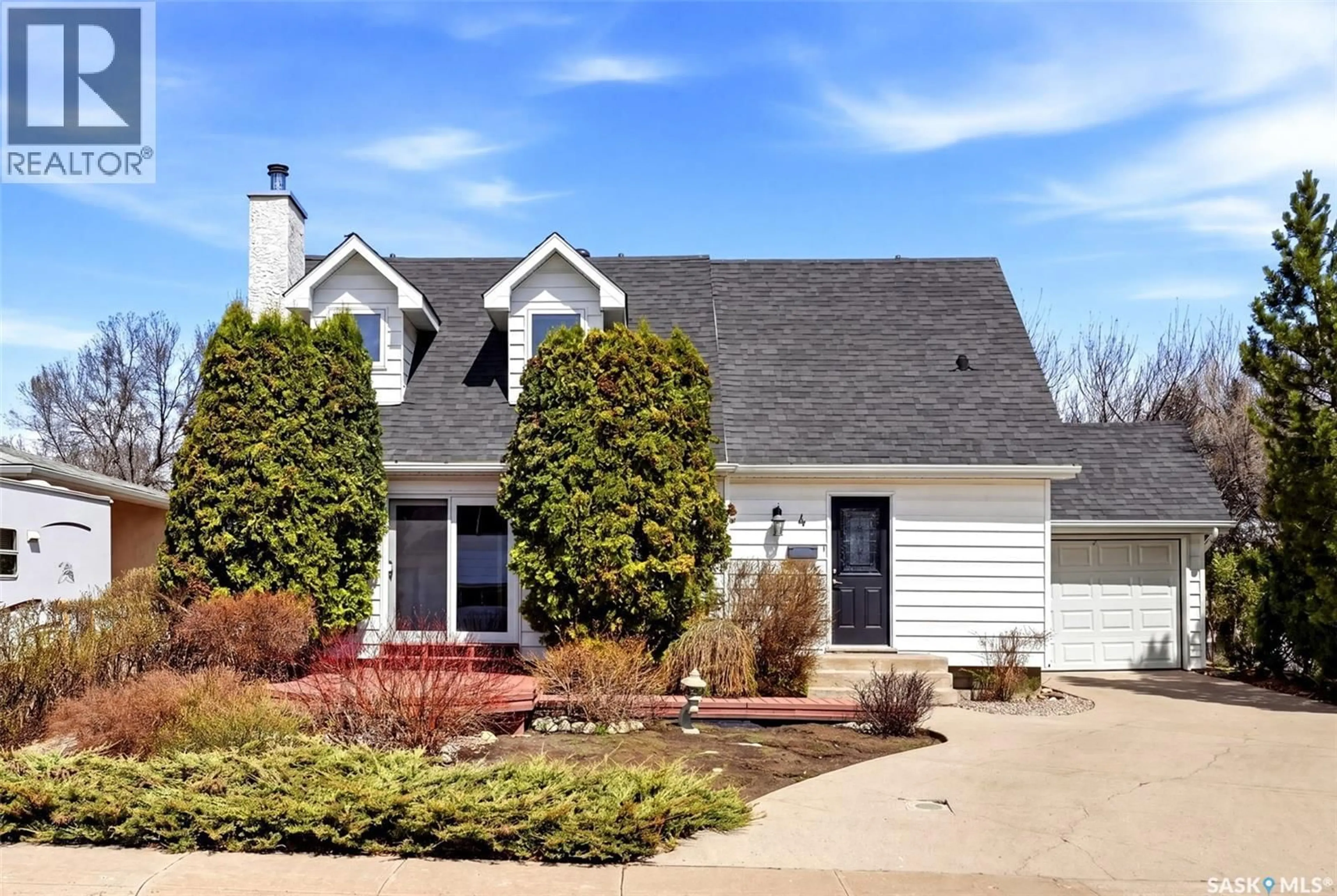 Home with vinyl exterior material, street for 4 BANNISTER AVENUE, Regina Saskatchewan S4R5K9