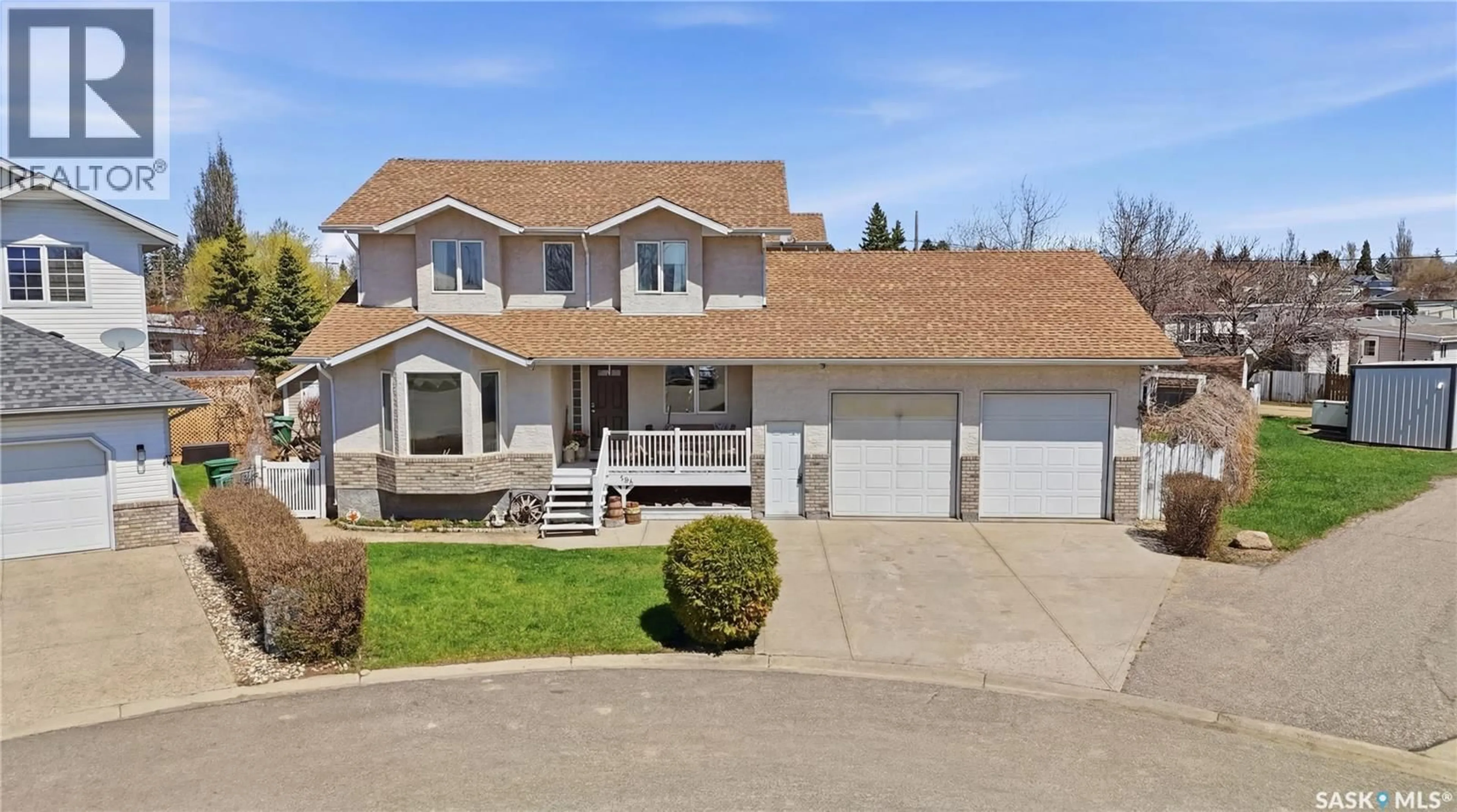 Home with vinyl exterior material, street for 403 WILLOW BAY, Balgonie Saskatchewan S0G0E0
