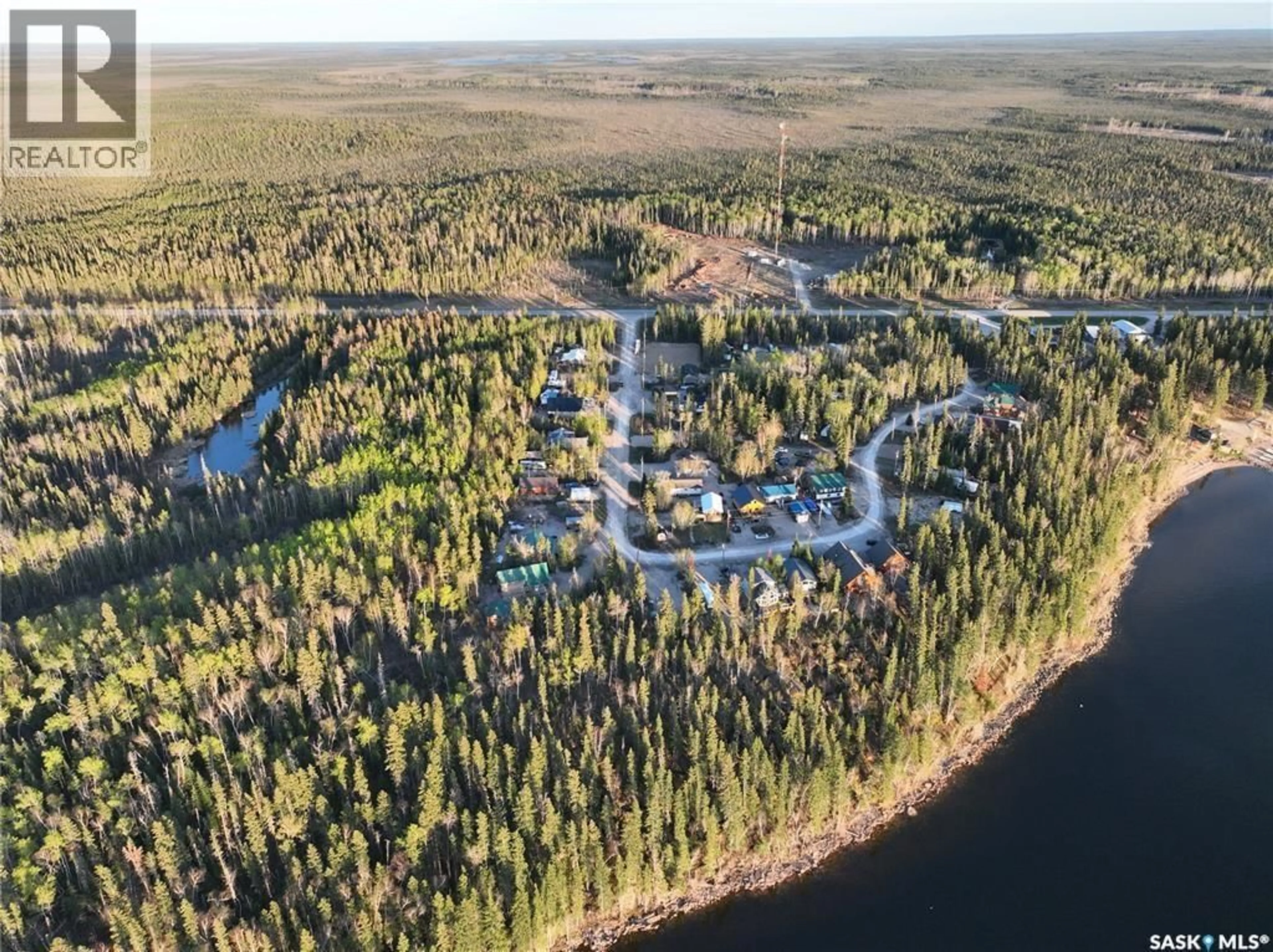 A pic from outside/outdoor area/front of a property/back of a property/a pic from drone, water/lake/river/ocean view for 106 LAKEVIEW DRIVE, Northern Admin District Saskatchewan S0P0A0