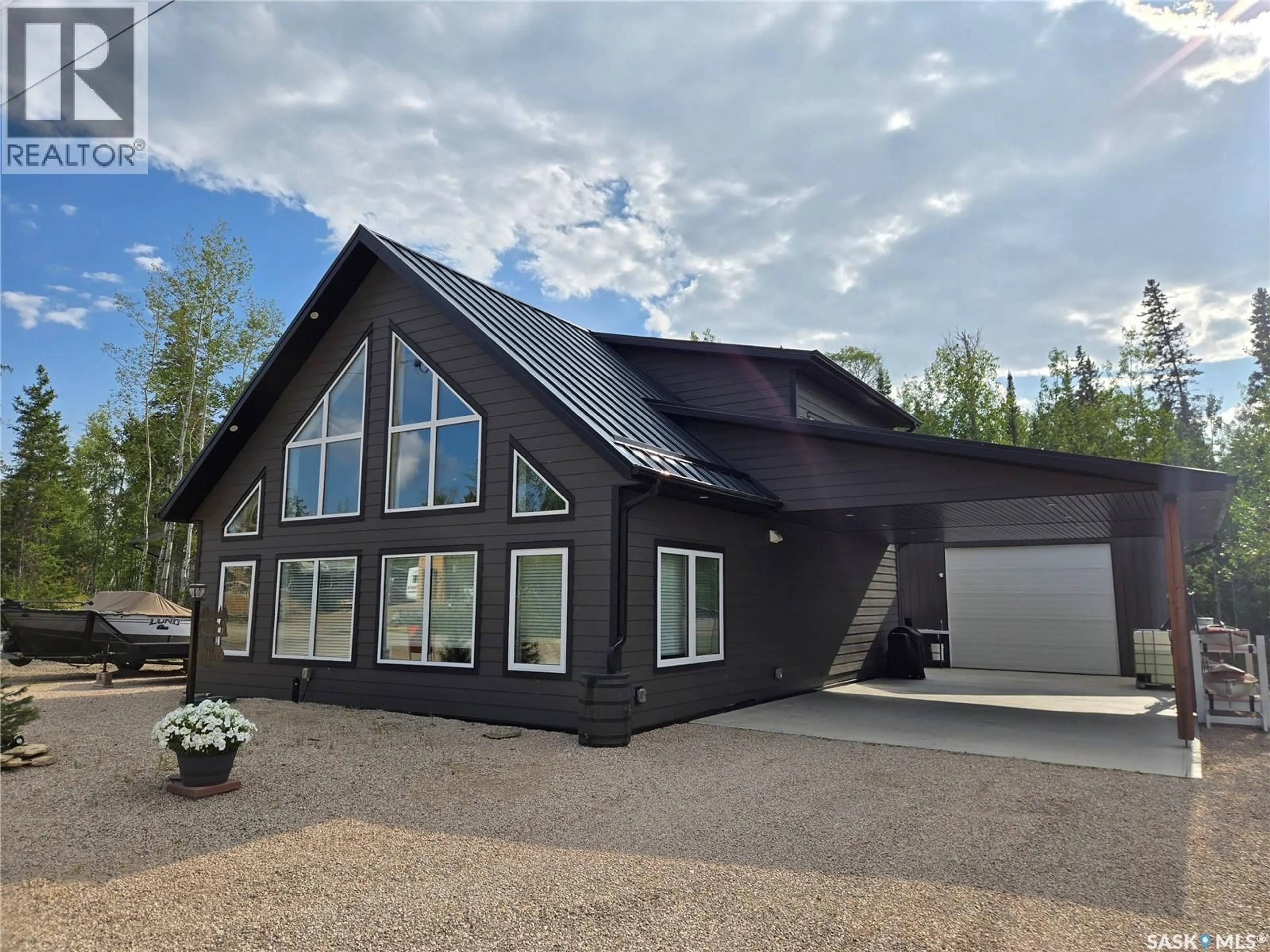 Home with vinyl exterior material, building for 106 LAKEVIEW DRIVE, Northern Admin District Saskatchewan S0P0A0