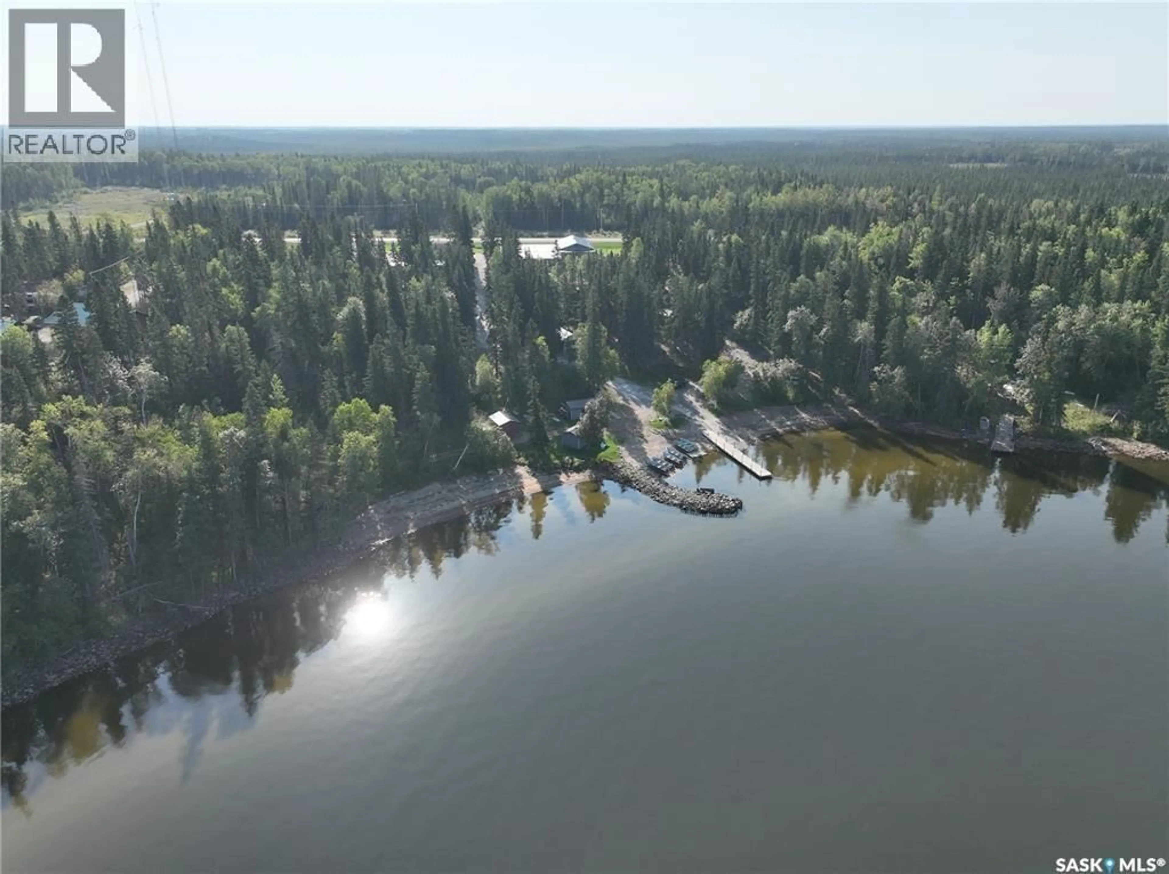 A pic from outside/outdoor area/front of a property/back of a property/a pic from drone, water/lake/river/ocean view for 106 LAKEVIEW DRIVE, Northern Admin District Saskatchewan S0P0A0