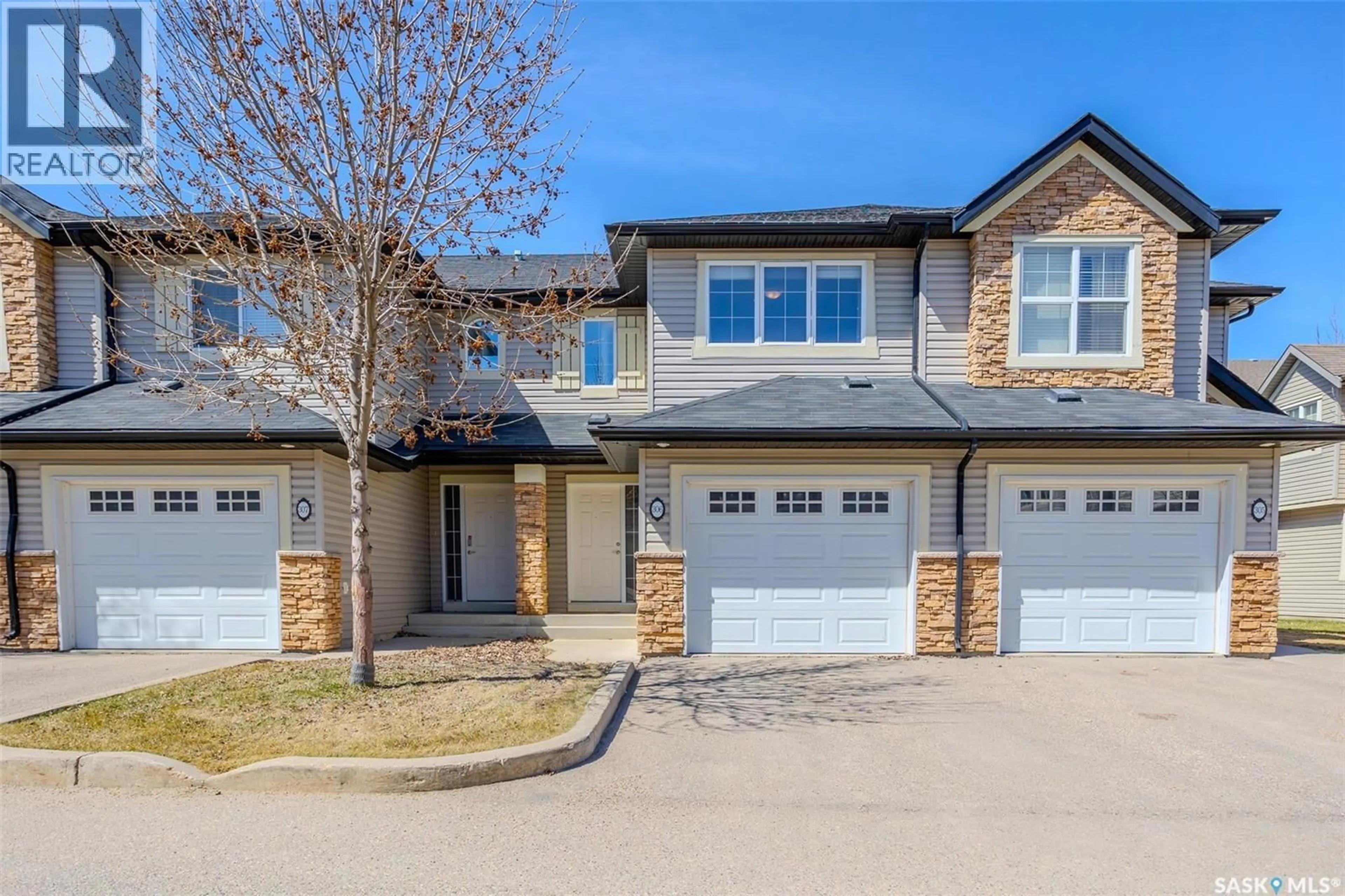 Home with brick exterior material, street for 105 - 306 LYND CRESCENT, Saskatoon Saskatchewan S7T0C3