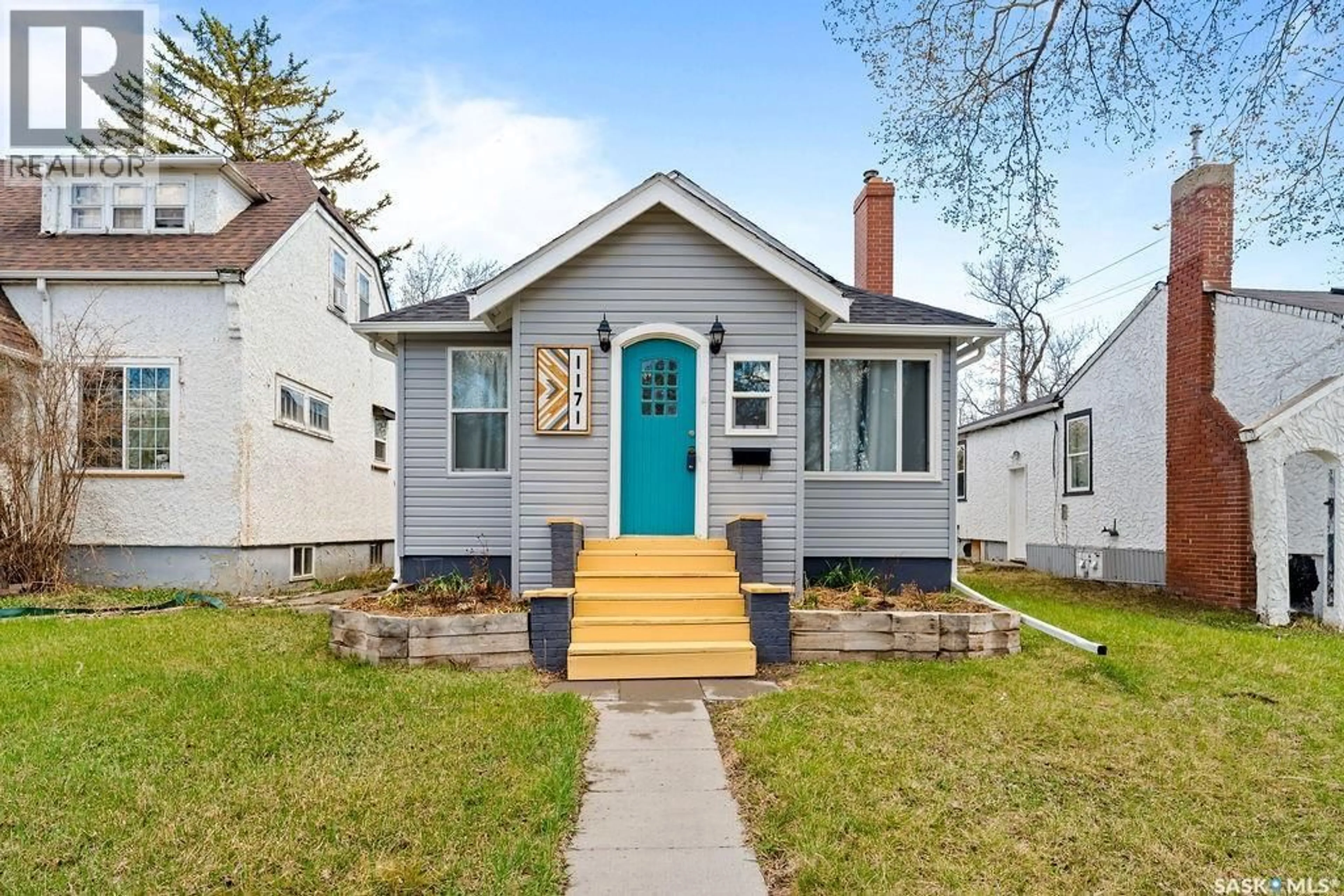 Home with vinyl exterior material, street for 1171 MONTAGUE STREET, Regina Saskatchewan S4T3H8