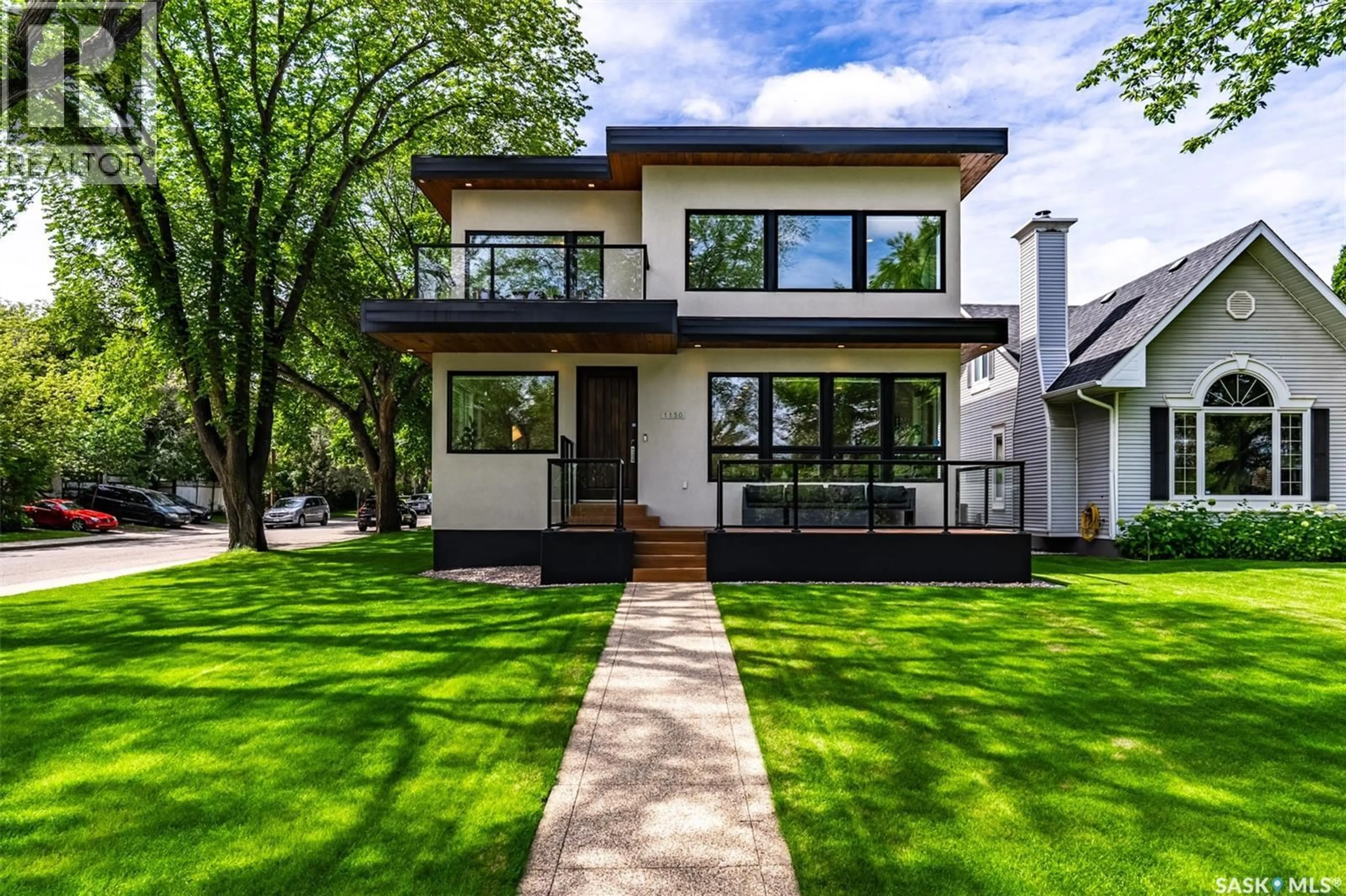Home with vinyl exterior material, street for 1150 SPADINA CRESCENT, Saskatoon Saskatchewan S7K3H8