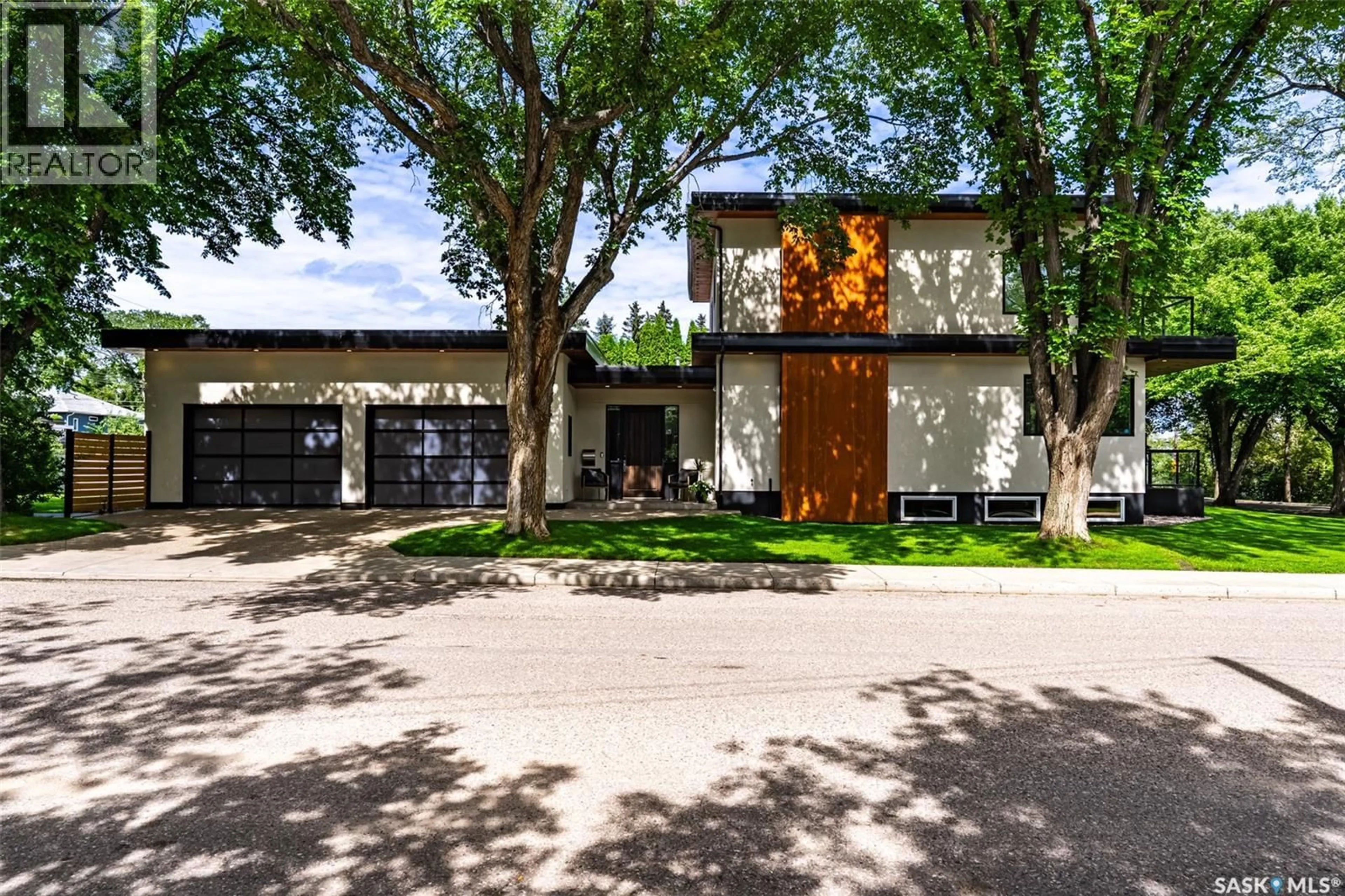 Home with brick exterior material, street for 1150 SPADINA CRESCENT, Saskatoon Saskatchewan S7K3H8