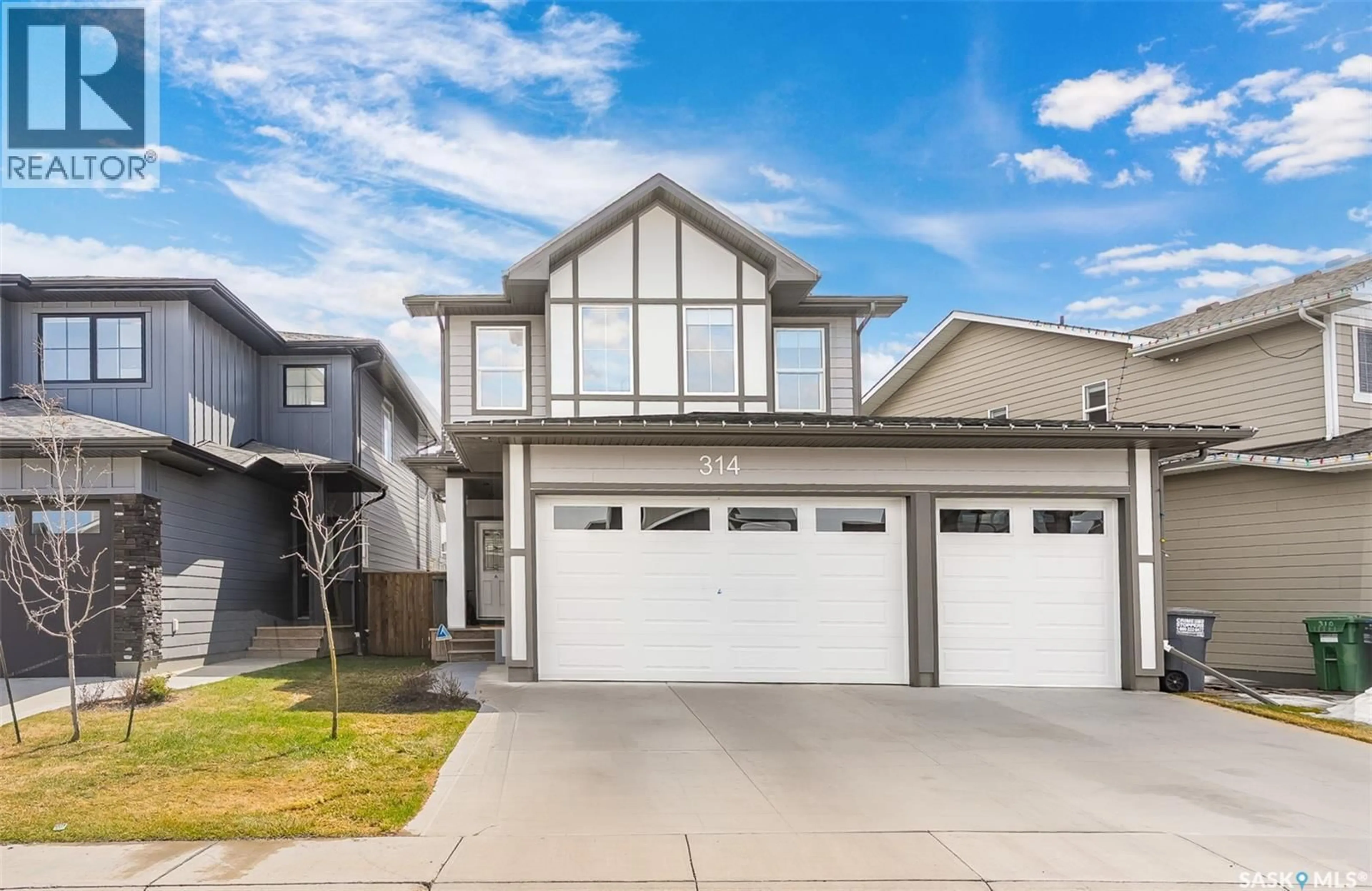 Home with vinyl exterior material, street for 314 KEITH UNION, Saskatoon Saskatchewan S7V0X8