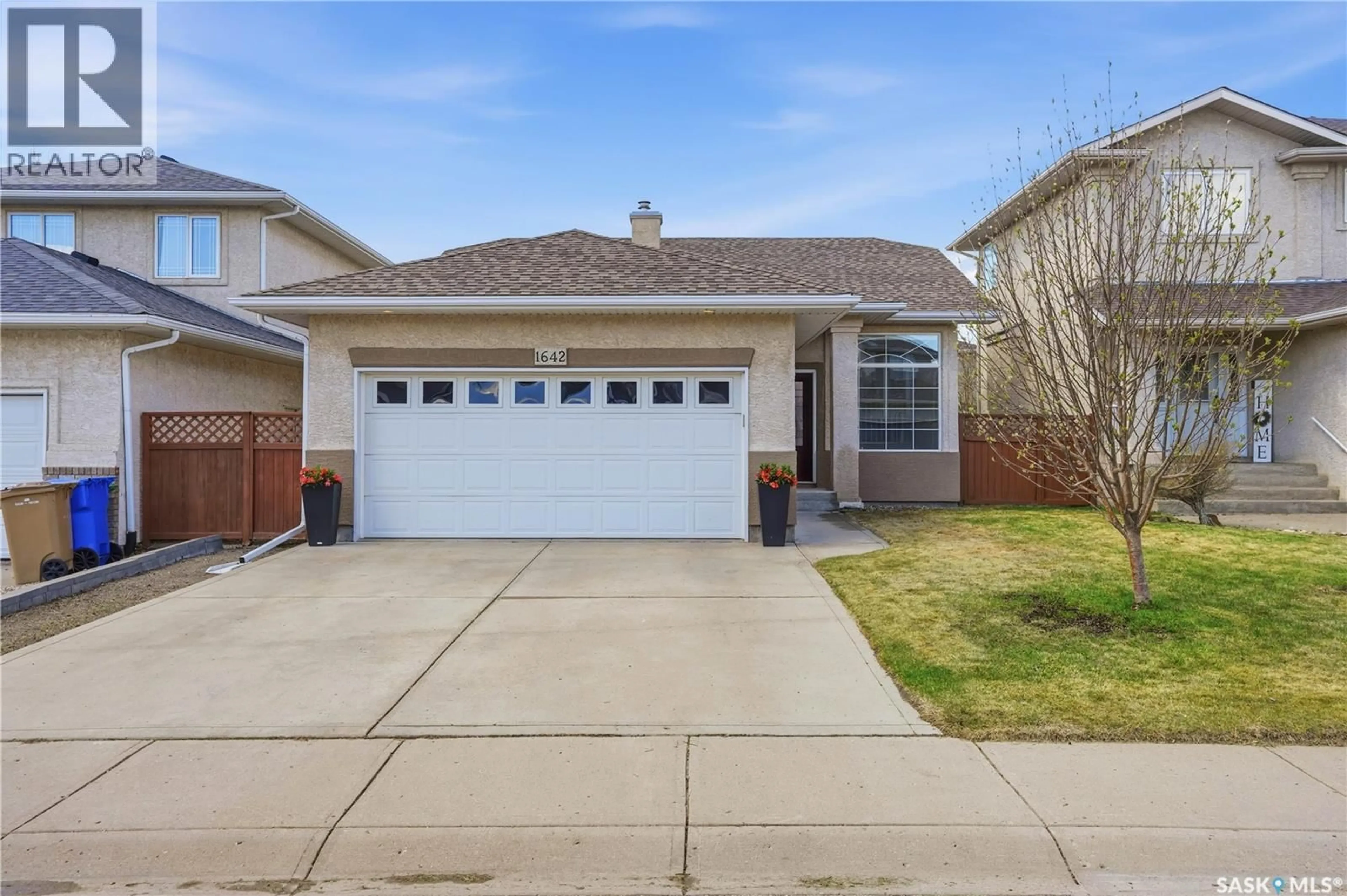 Home with vinyl exterior material, street for 1642 WINGERT DRIVE, Regina Saskatchewan S4X4P9