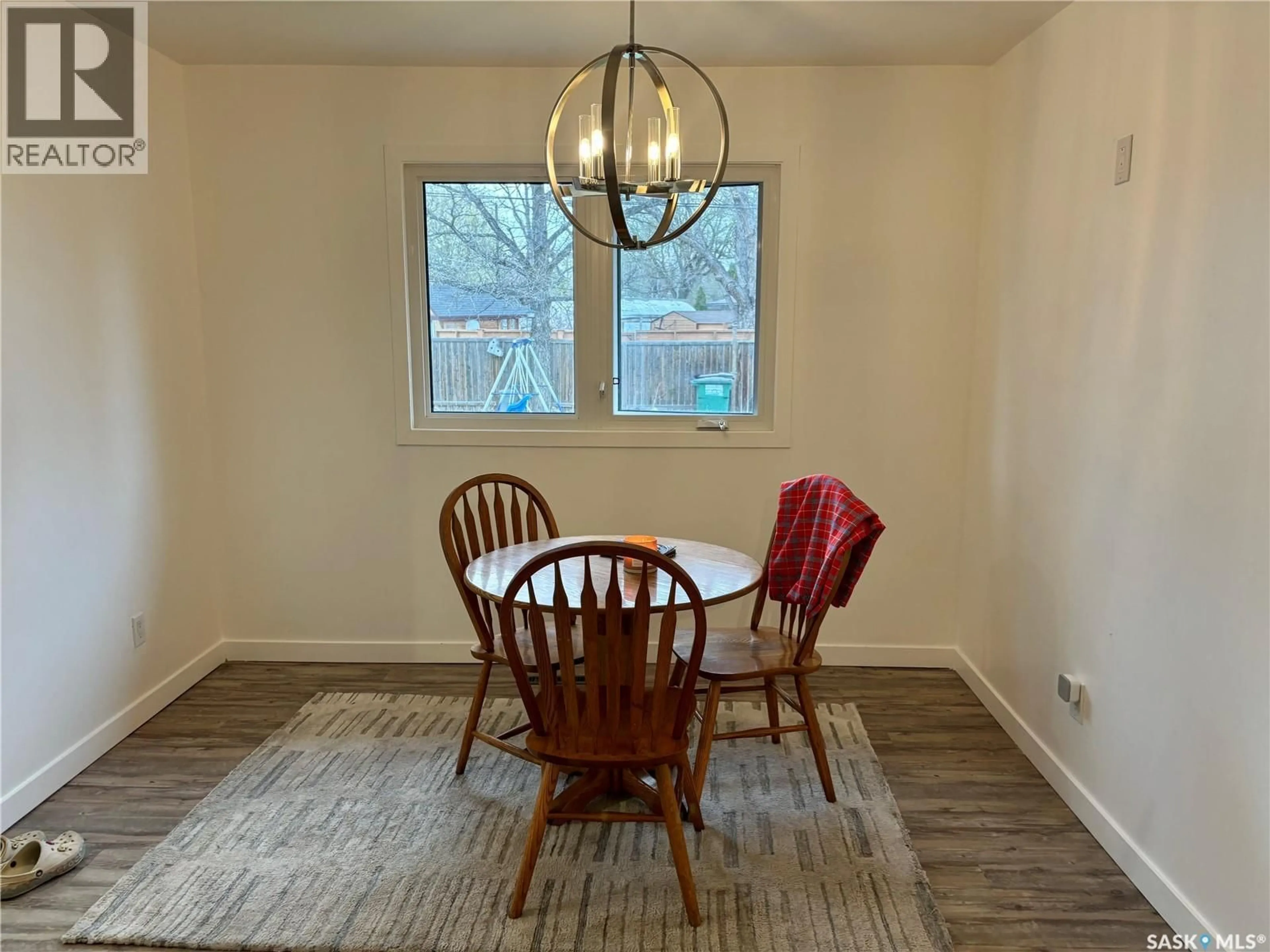 Dining room, wood/laminate floor for 1113 WILSON CRESCENT, Saskatoon Saskatchewan S7J2M7