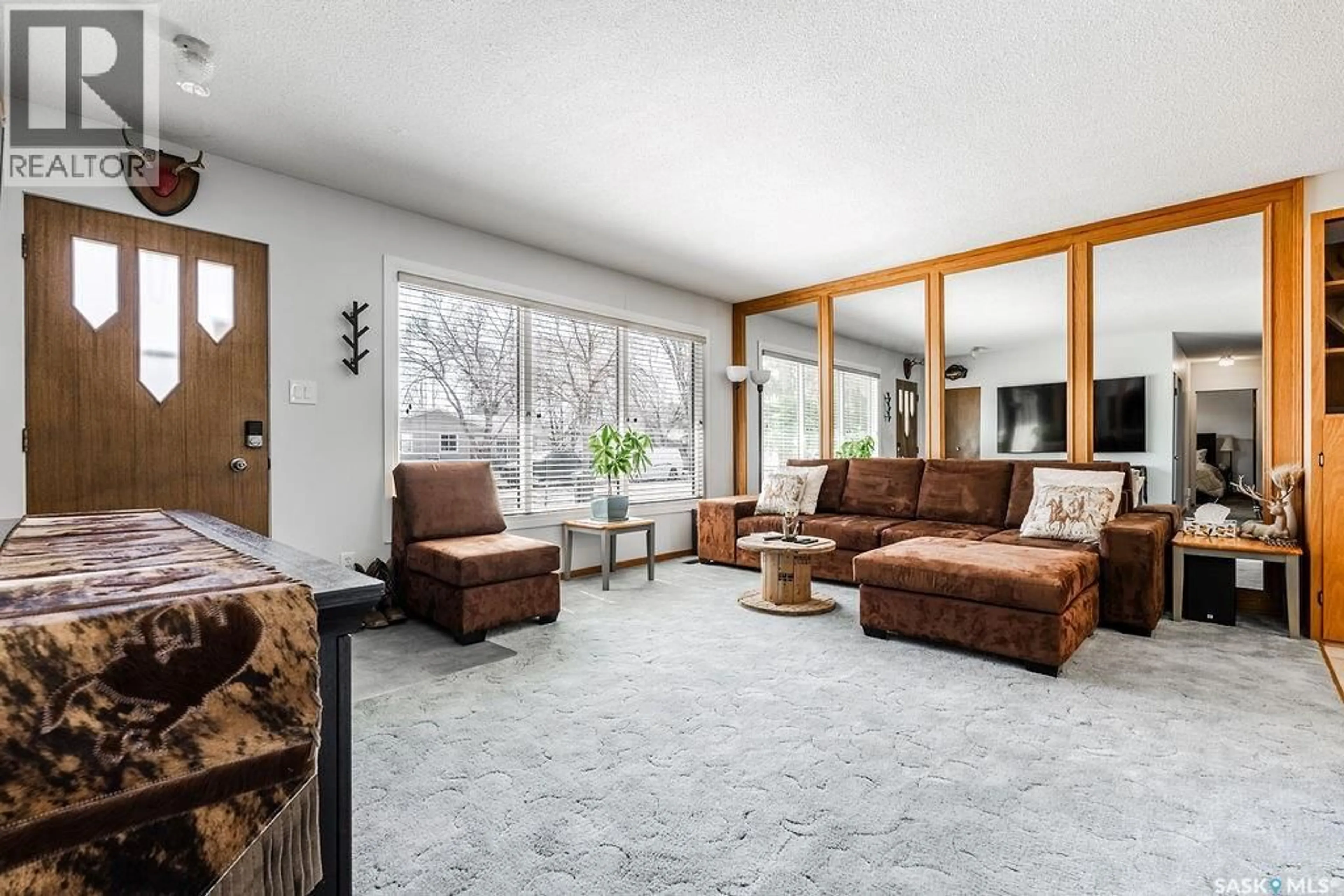 Living room with furniture, unknown for 211 2ND STREET, Langham Saskatchewan S0K0T6
