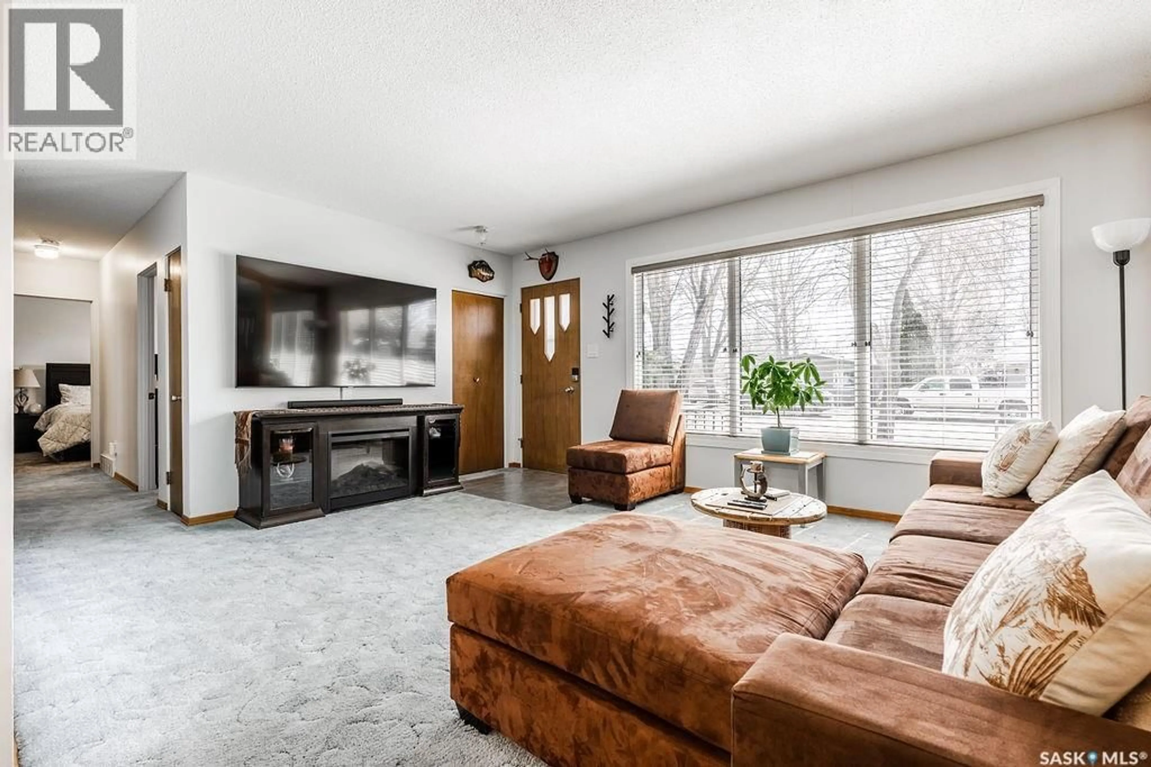 Living room with furniture, unknown for 211 2ND STREET, Langham Saskatchewan S0K0T6
