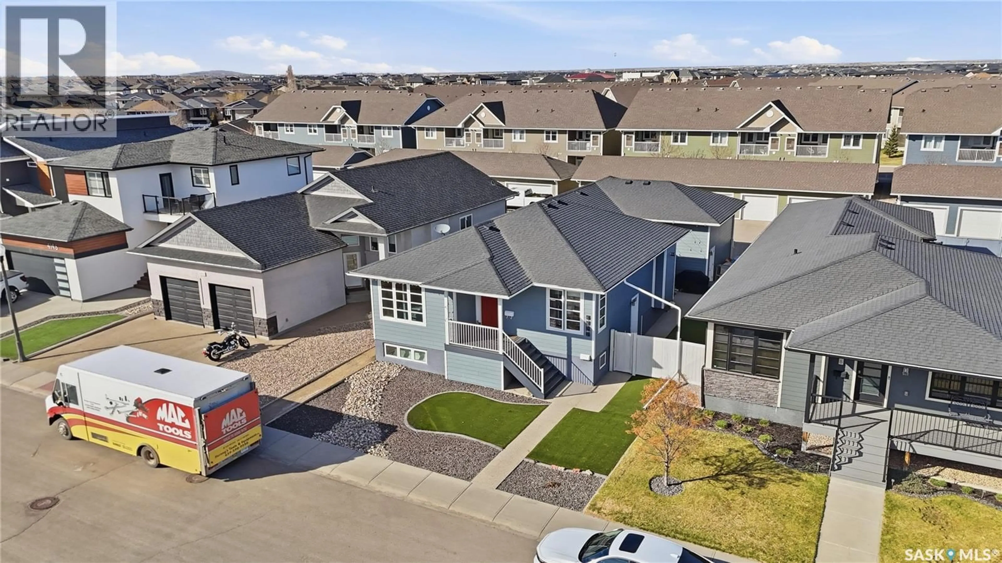 A pic from outside/outdoor area/front of a property/back of a property/a pic from drone, street for E - 4202 GREEN OLIVE WAY, Regina Saskatchewan S4V1P8