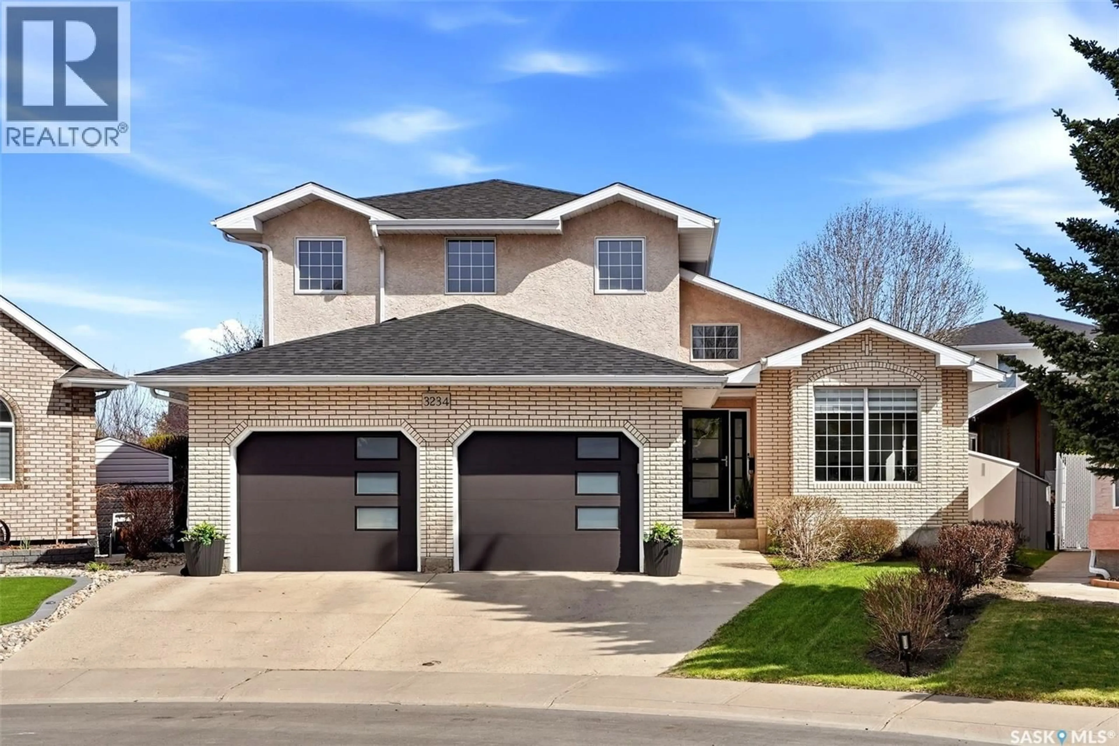 Home with brick exterior material, street for E - 3234 PEYSON BAY, Regina Saskatchewan S4V2W8