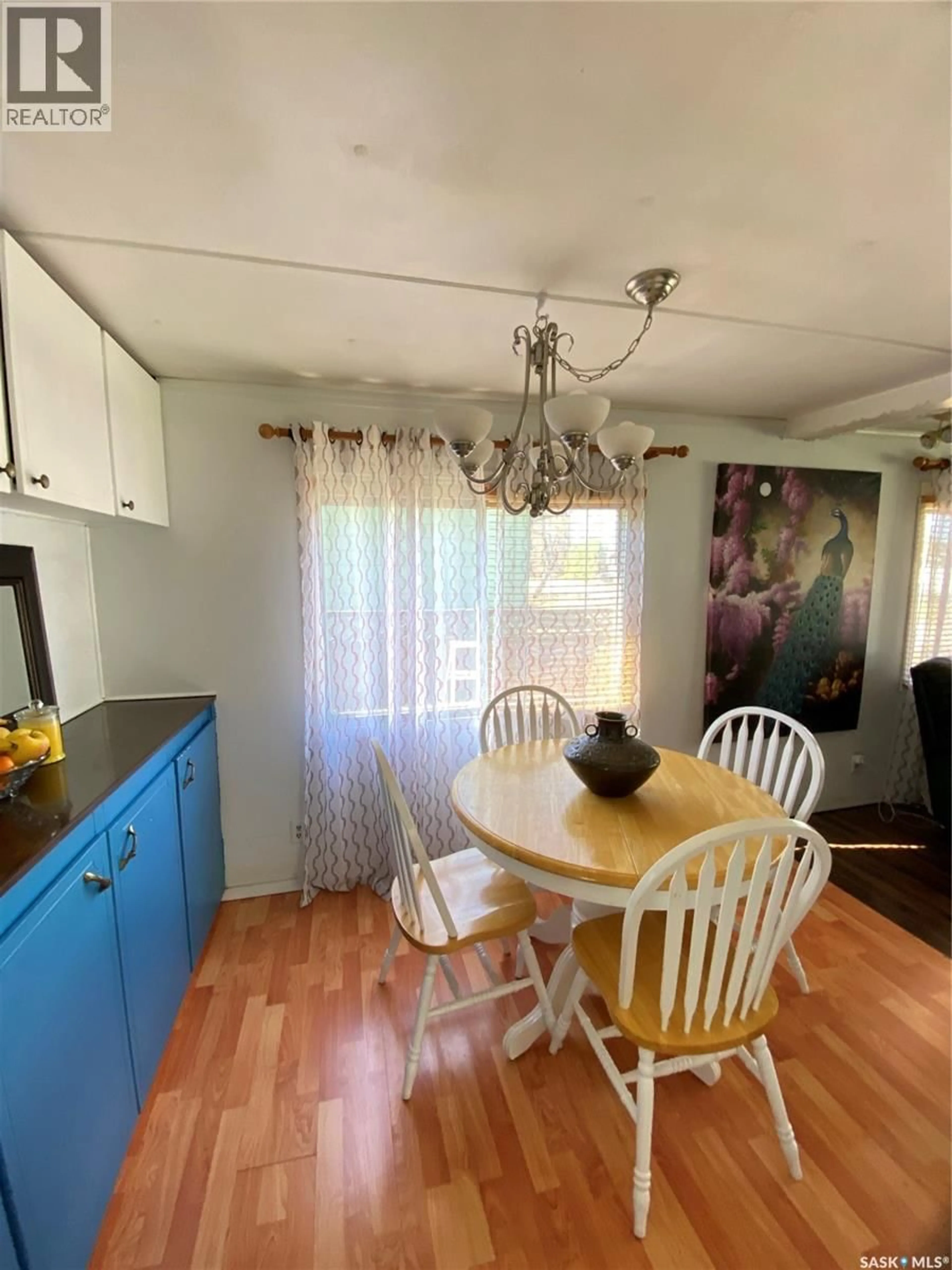 Dining room, wood/laminate floor for 206 ALBERT STREET, Hudson Bay Saskatchewan S0E0Y0