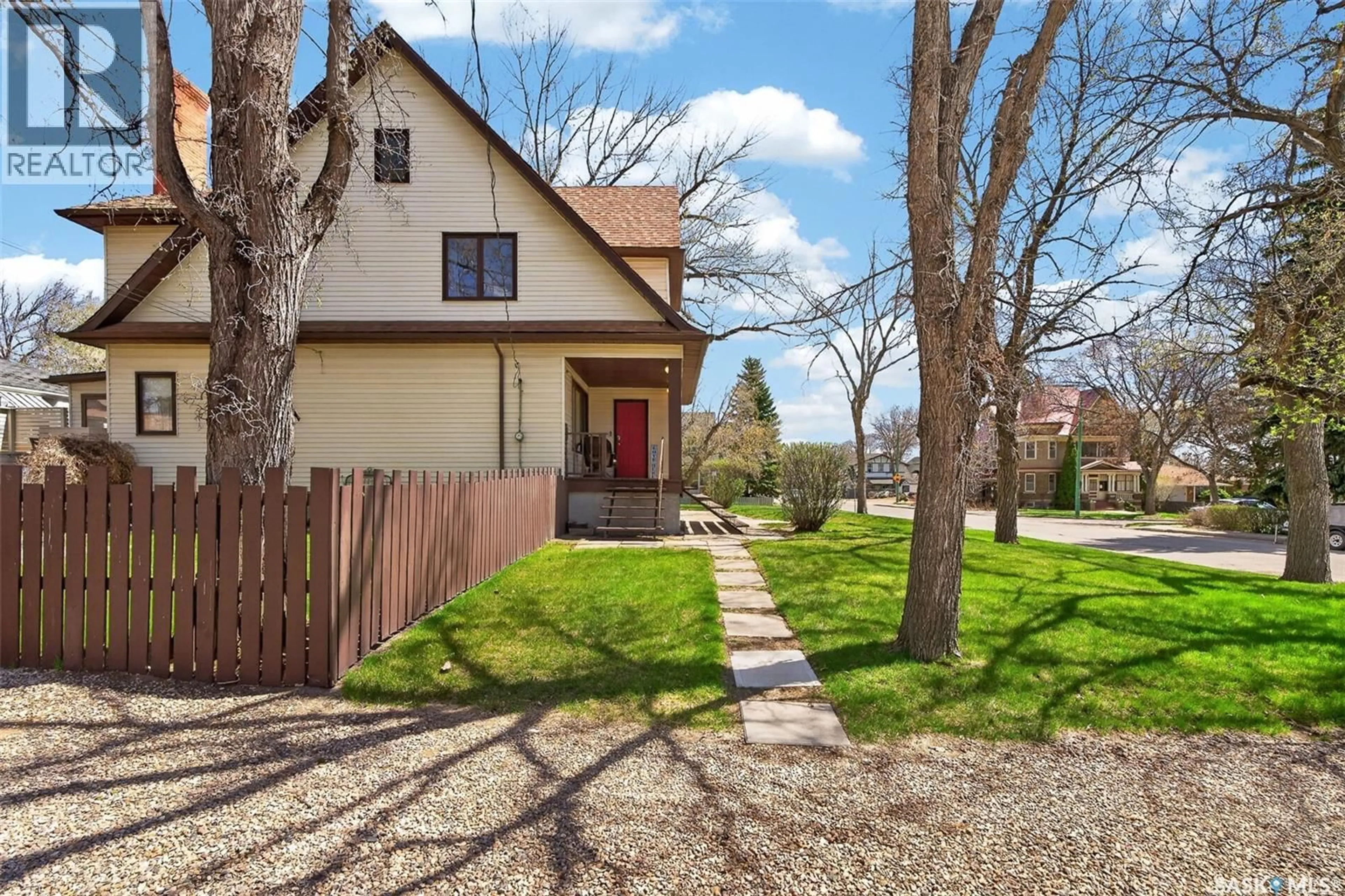 Home with brick exterior material, street for 1108 REDLAND AVENUE, Moose Jaw Saskatchewan S6H3P3