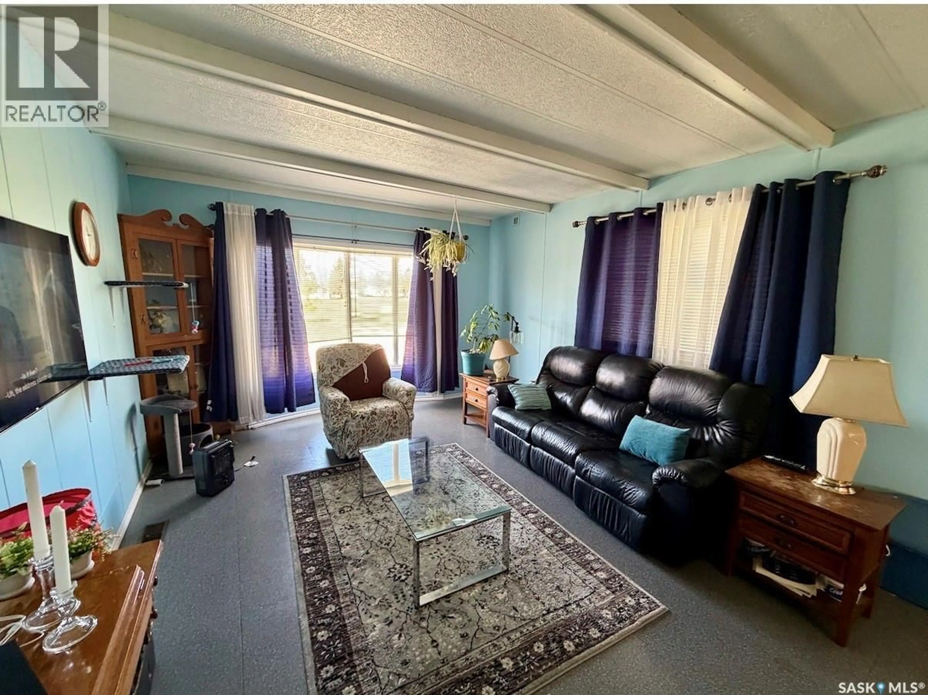 Living room with furniture, unknown for 509 TOEWS STREET, Morse Saskatchewan S0H3C0